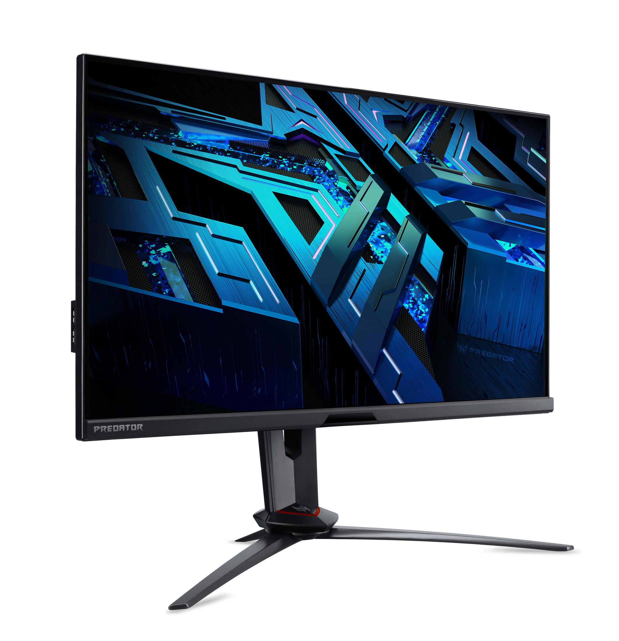 Ein großer schwarzer Computermonitor mit blauer und schwarzer Grafik, auf weißem Hintergrund.