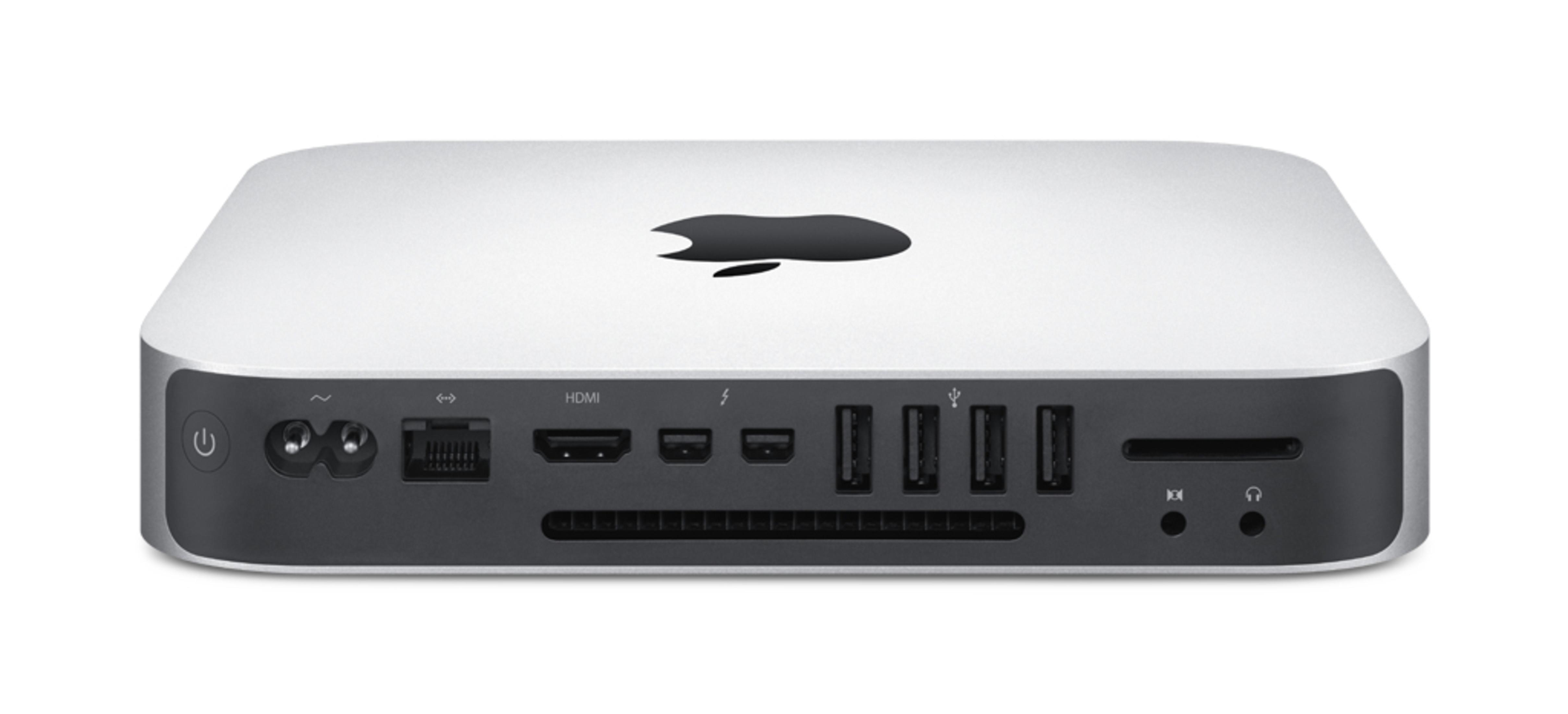 Ein silberner und weißer Apple Mac Mini mit Anschlüssen auf der Rückseite und Apple-Logo oben.