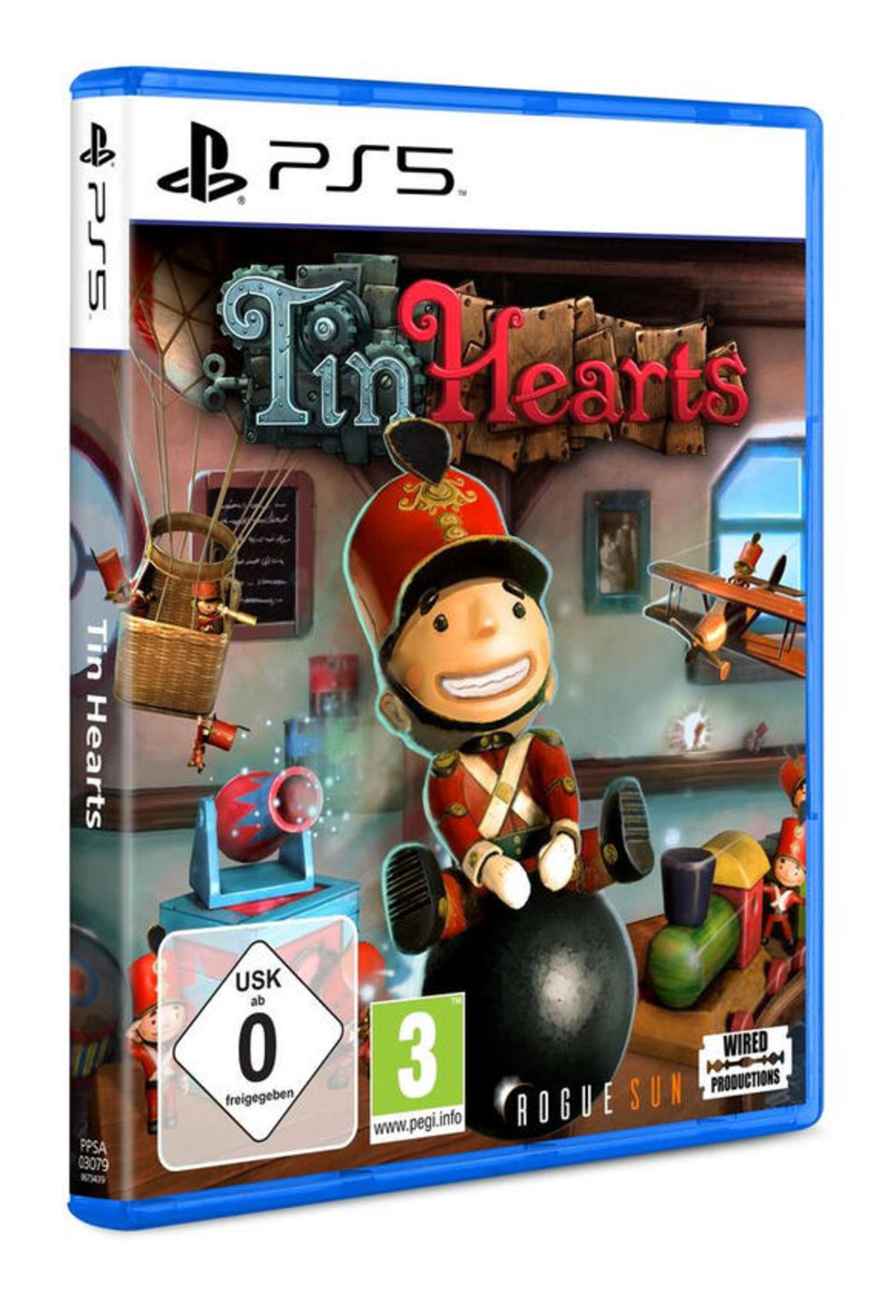 Una scatola di videogiochi di 'Tin Hearts' presenta un soldato giocattolo su un cannone nero.