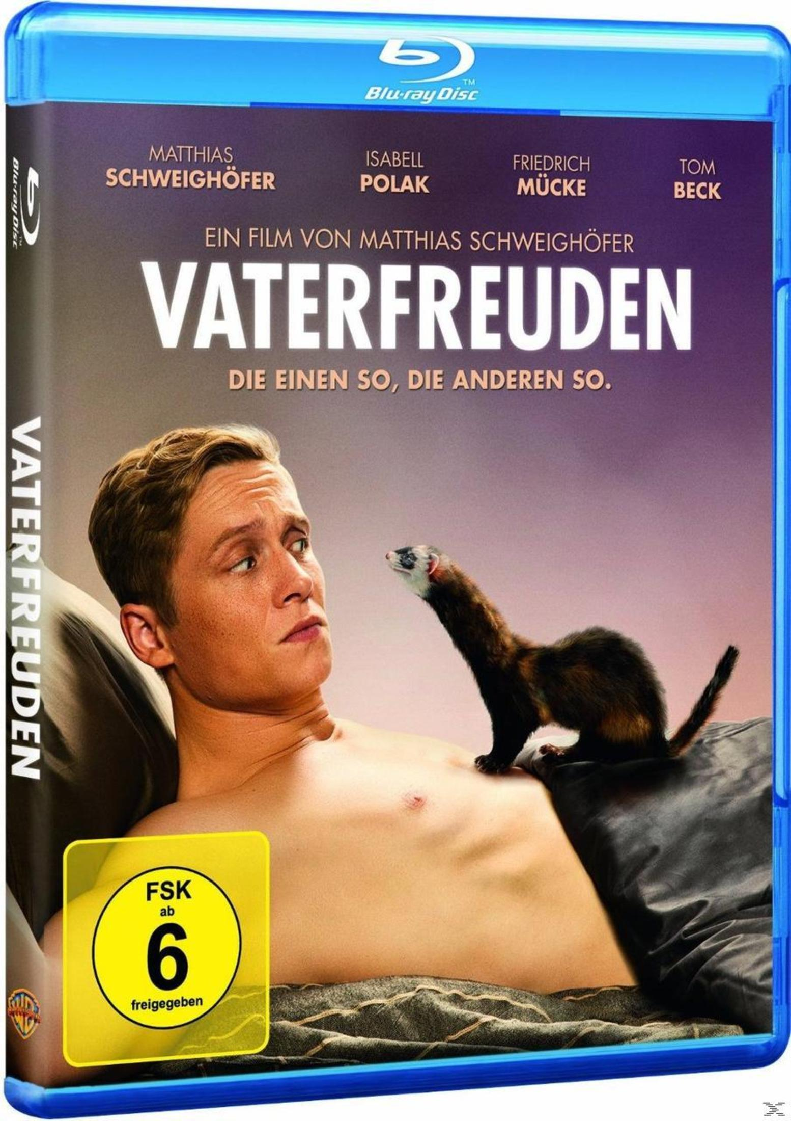 DVD-Hülle von Vaterfreuden. Mann auf dem Bett mit Frettchen.