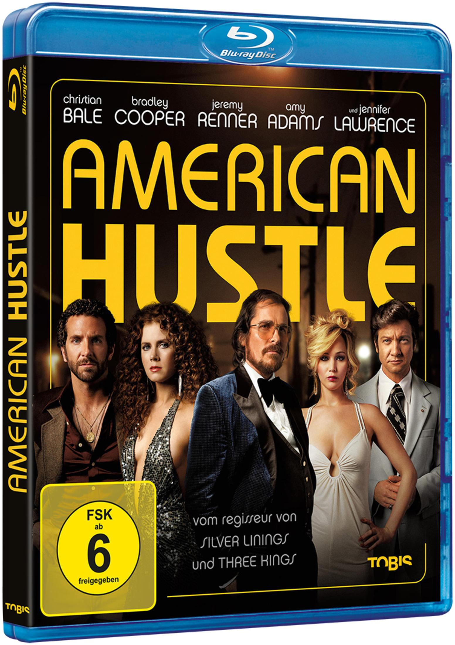 Blu-ray-Filmcover von American Hustle mit einer Gruppe von Schauspielern.