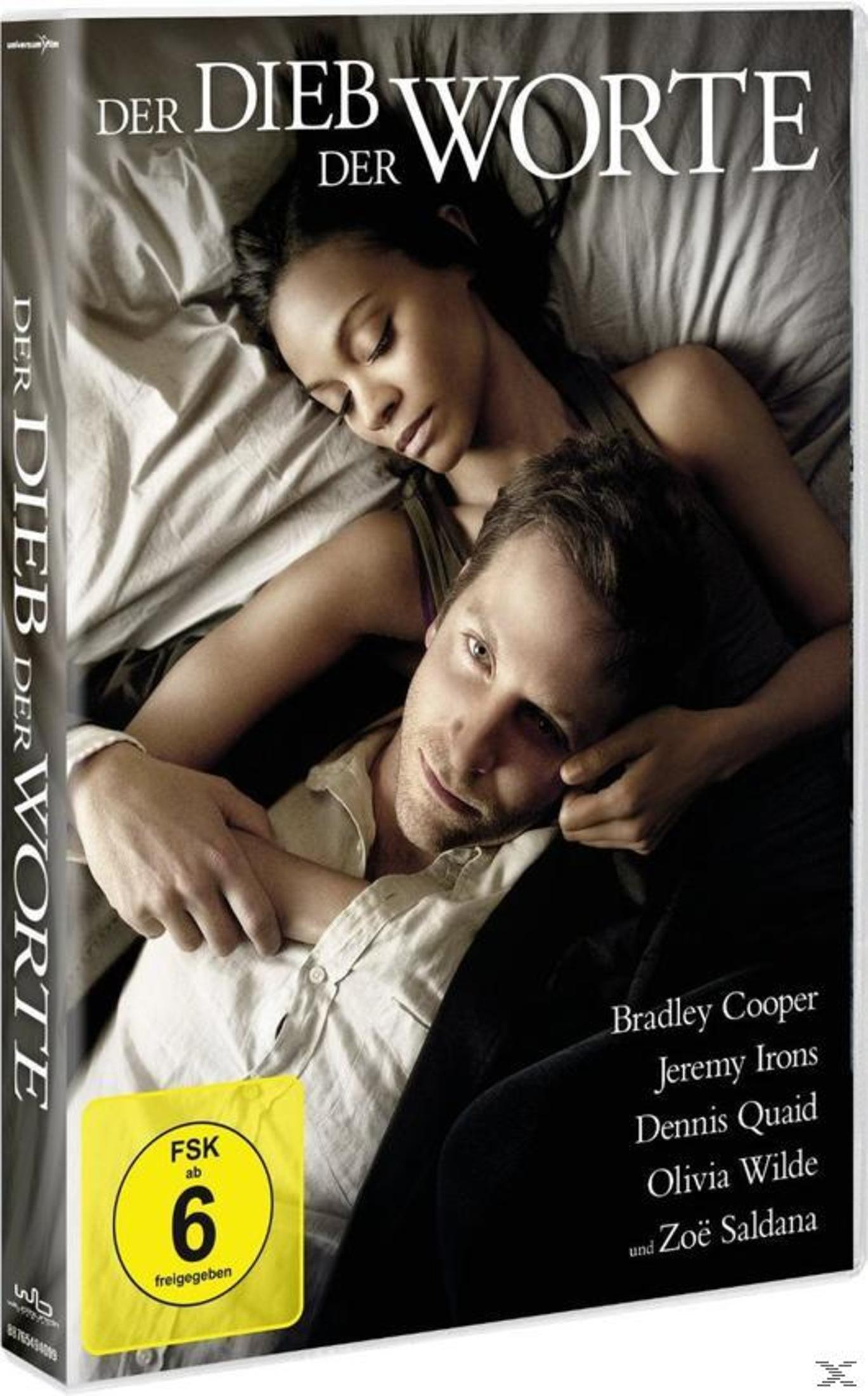 The Words DVD-Cover. Ein Mann und eine Frau umarmen sich, auf einem Bett liegend.