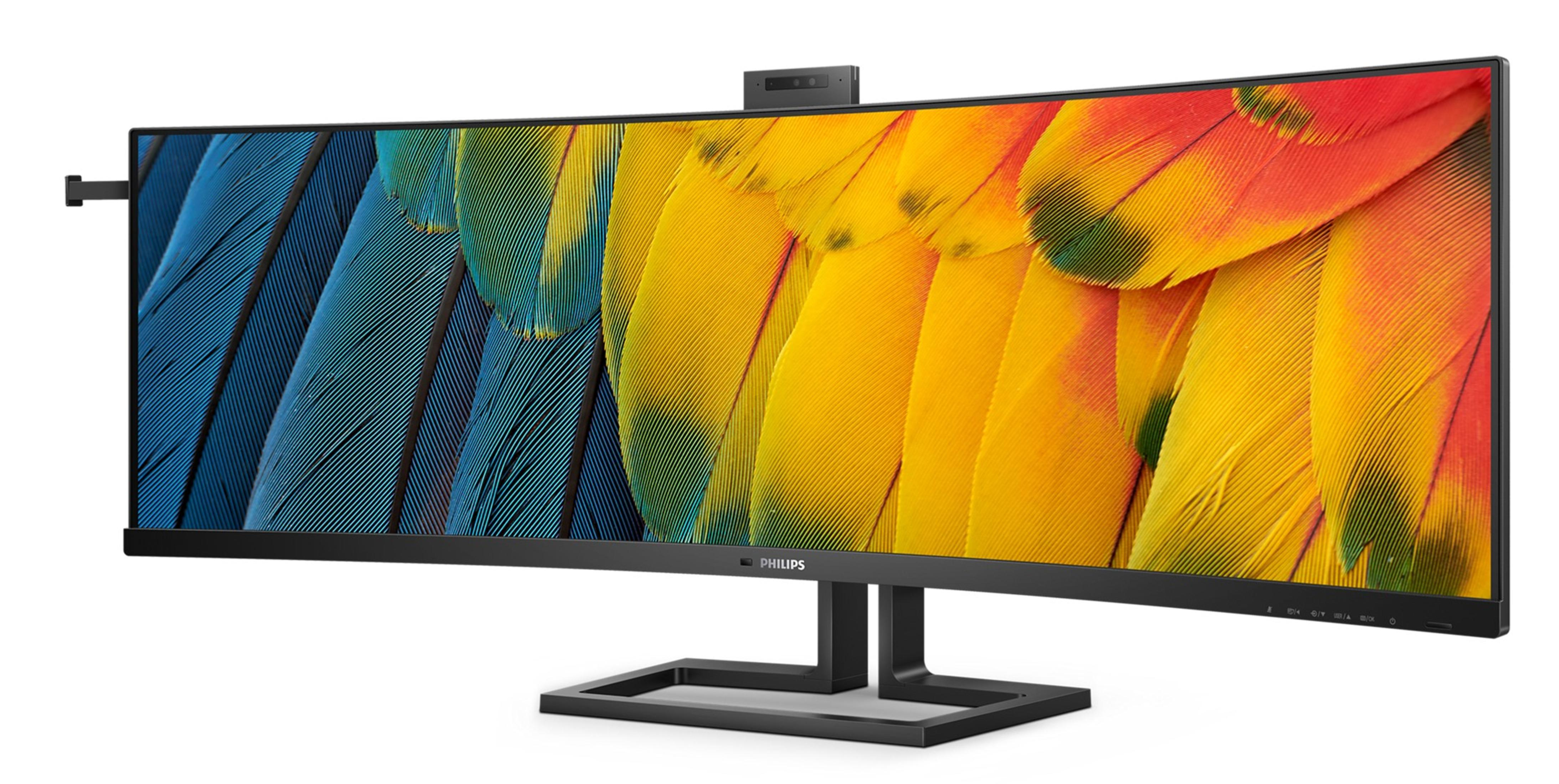 Zakrzywiony monitor komputera z kolorowym wzorem piór na ekranie i czarną ramką.