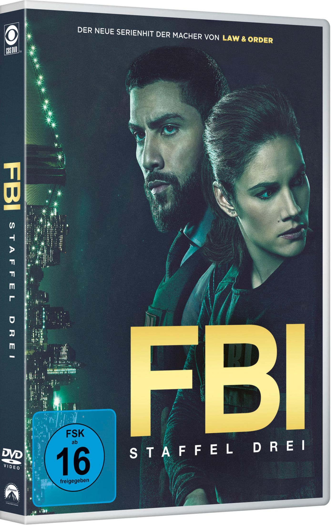DVD-Cover von FBI Staffel Drei mit zwei Personen vor einer nächtlichen Stadt.