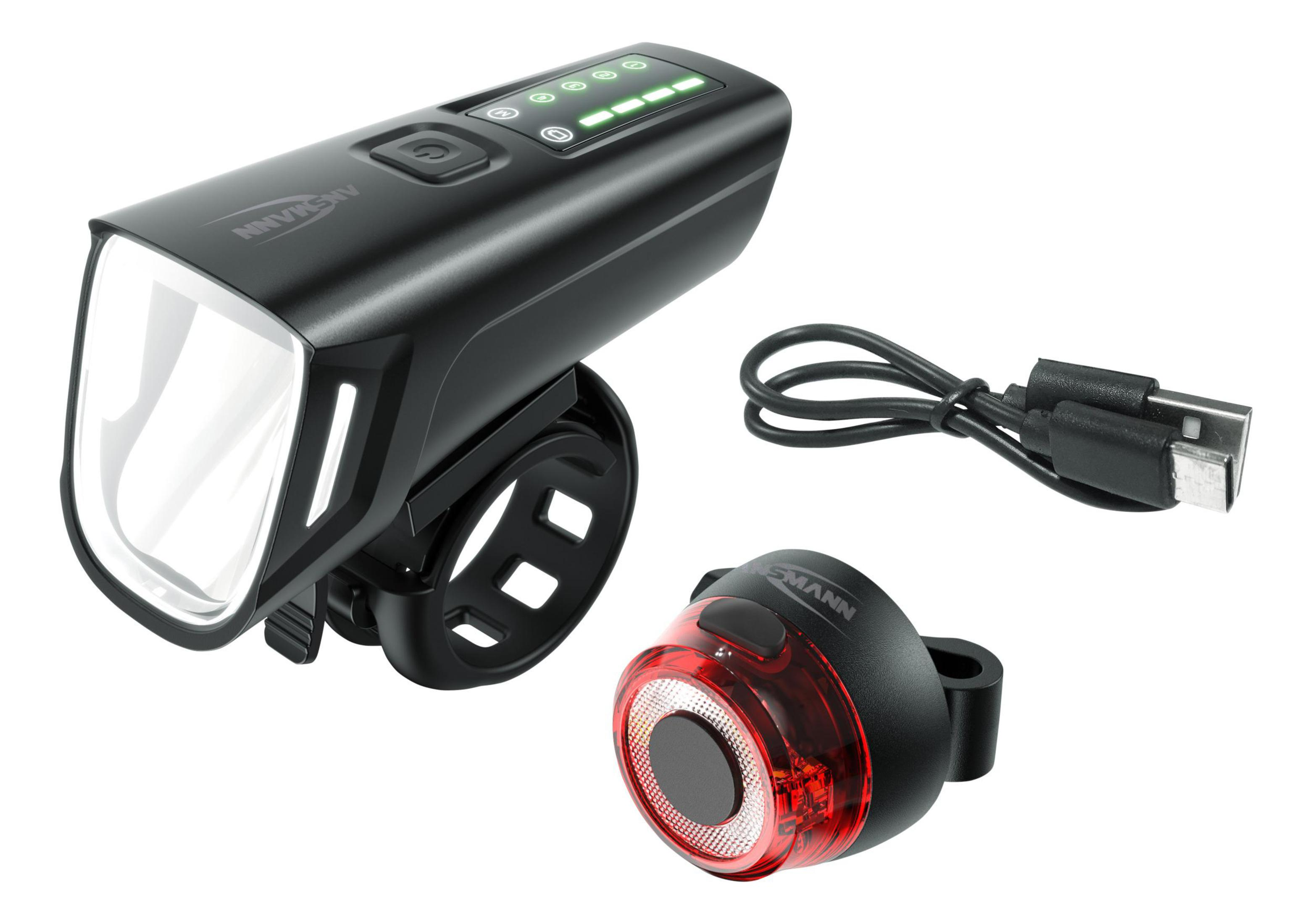 Ein schwarzes Fahrradlicht-Set mit Hauptlicht und Rücklicht sowie einem USB-Kabel.