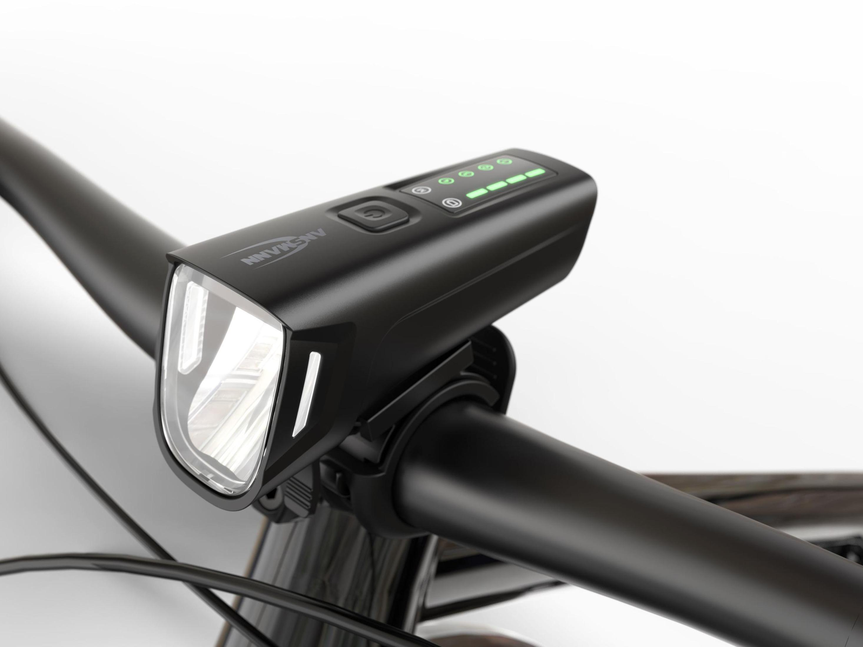 Ein schwarzes Fahrradlicht mit Lichtstrahl.