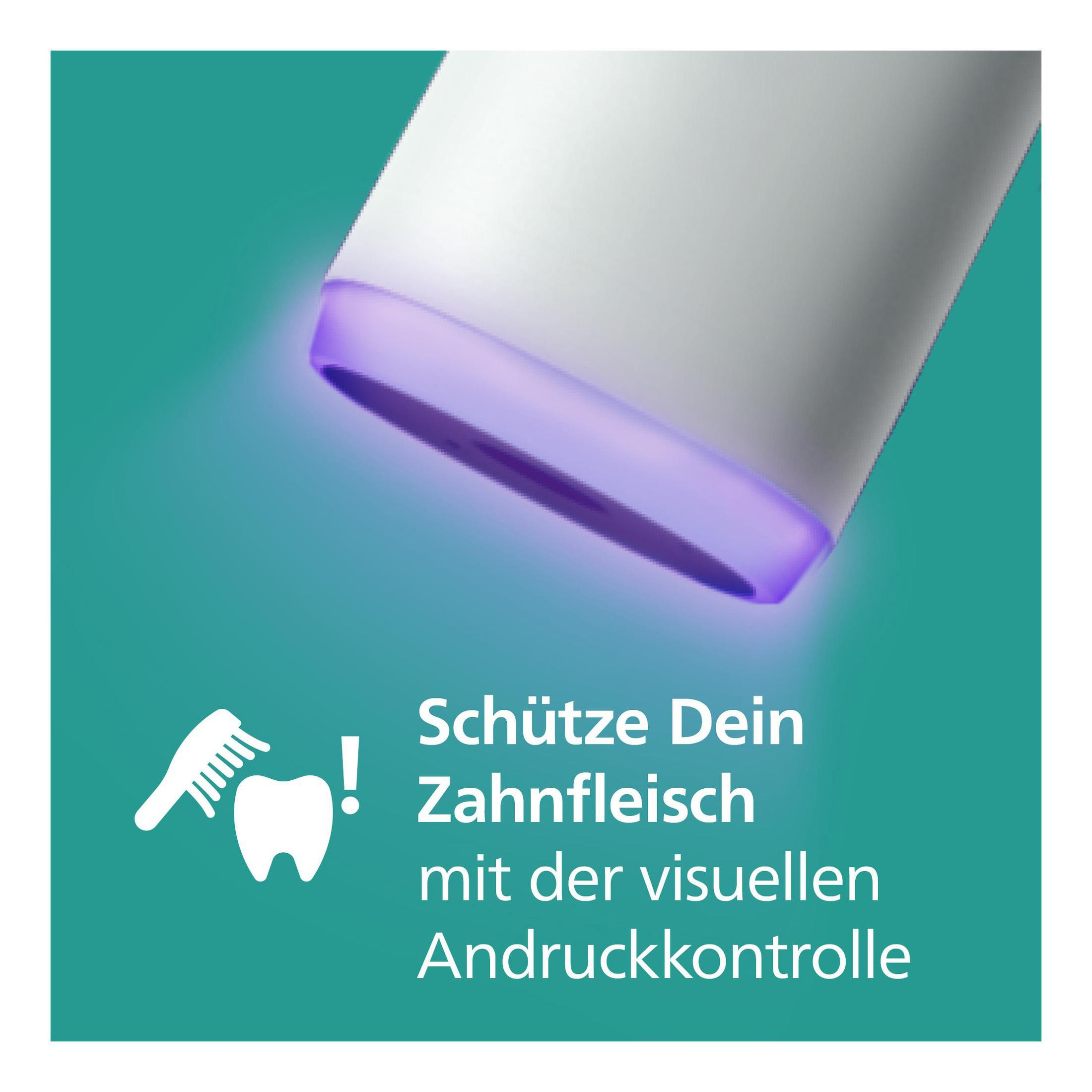 Un dispositivo blanco con luz morada y texto en alemán sobre la protección de las encías con control visual.