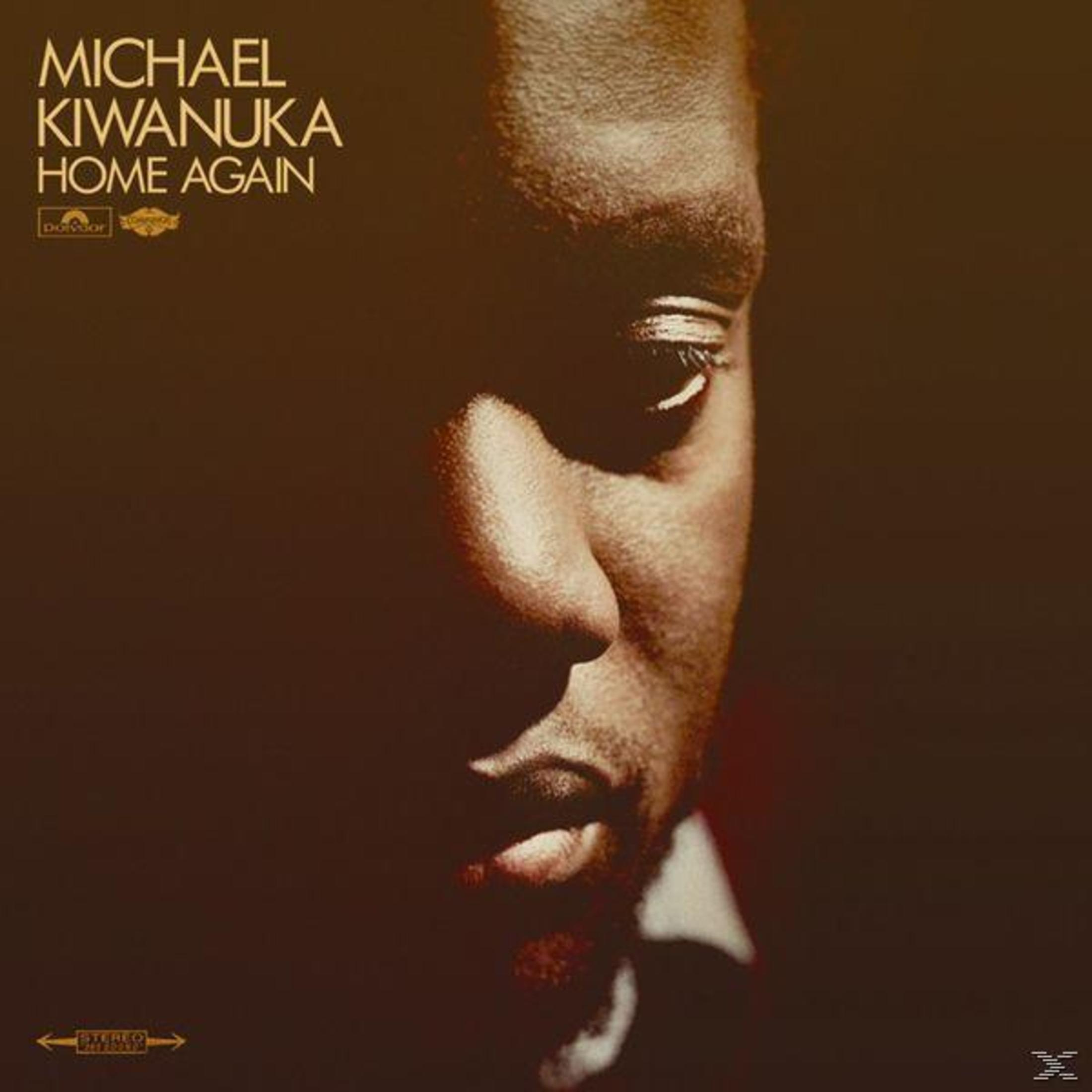 Copertina dell'album con il volto di un uomo di colore, testo: 'Home Again'.