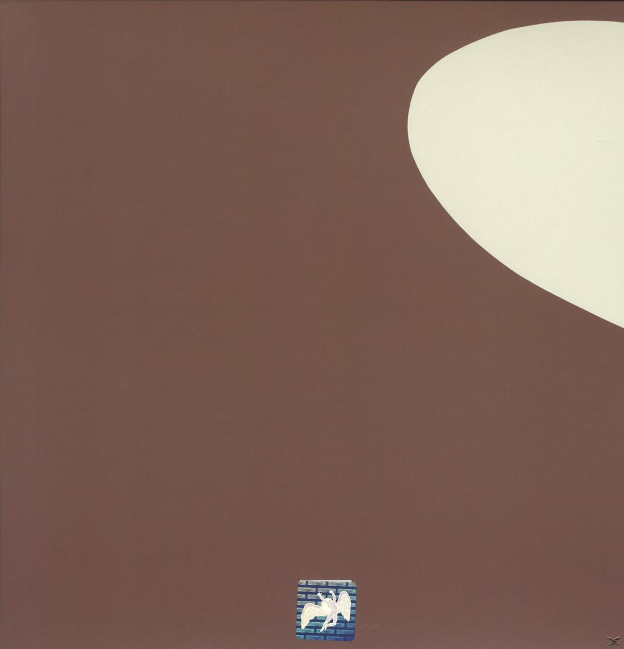 Fond uni avec une forme de cœur blanc. En dessous, une petite image d'un mur de briques.