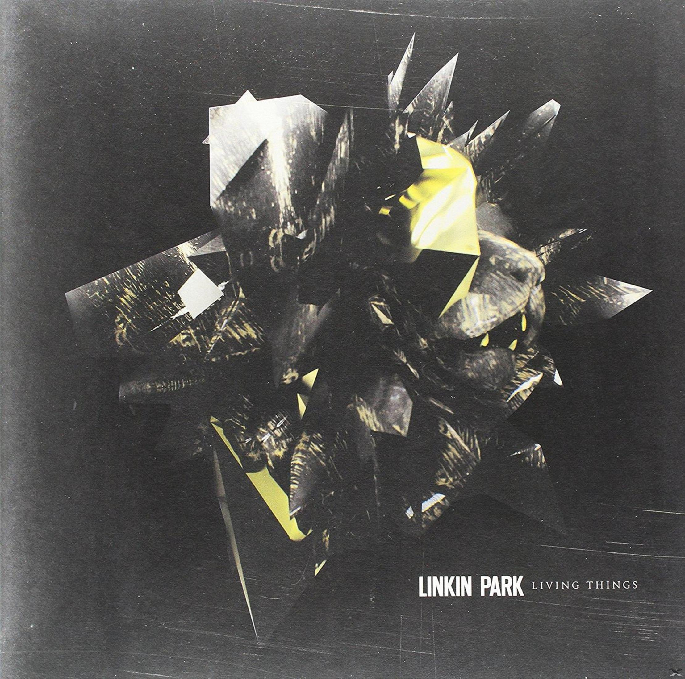 Copertina dell'album con una forma geometrica. Testo: Linkin Park, Living Things. Sfondo: scuro.