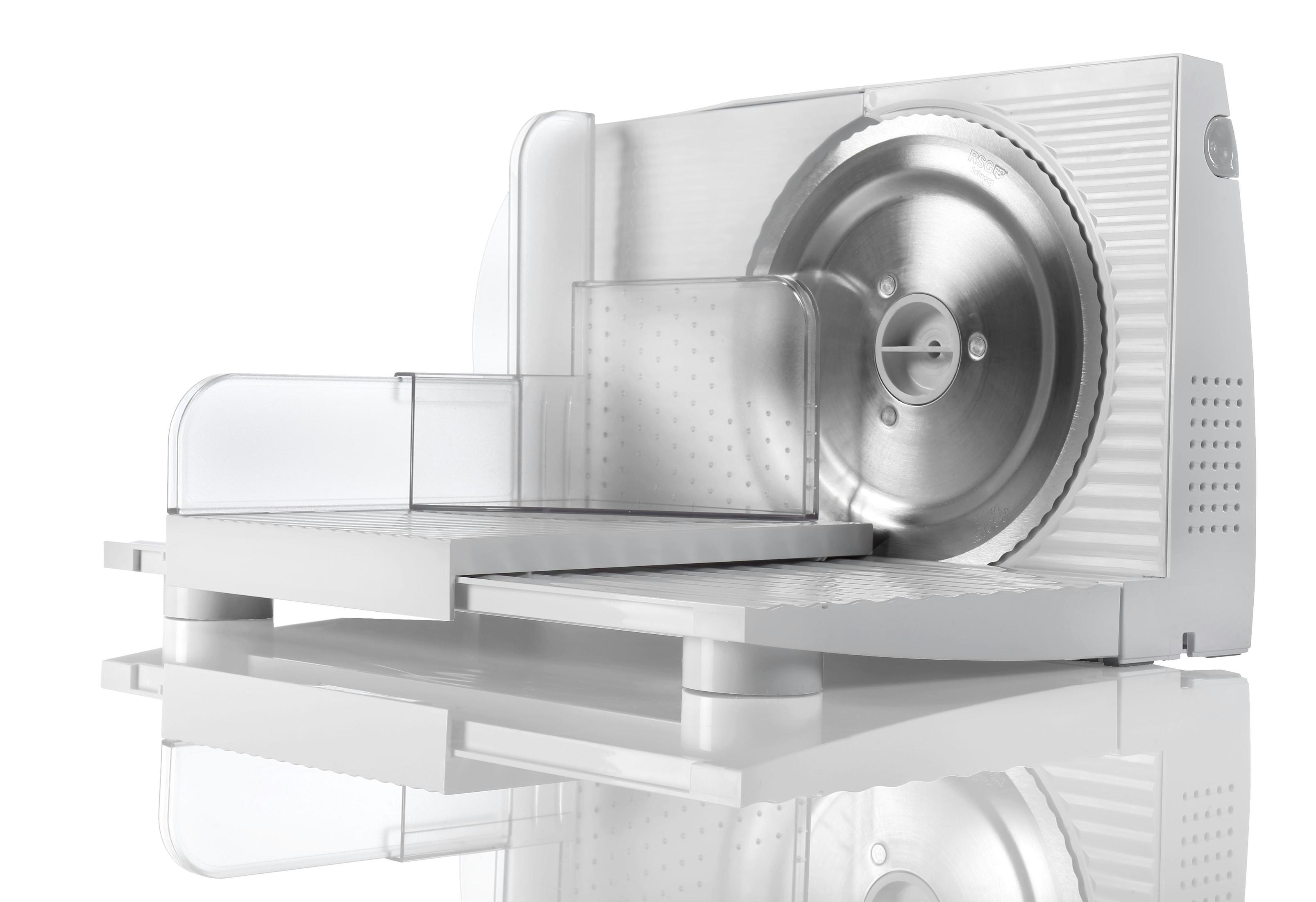 Biała krajalnica do żywności z okrągłym ostrzem i przezroczystymi plastikowymi elementami. Widoczne odbicia.