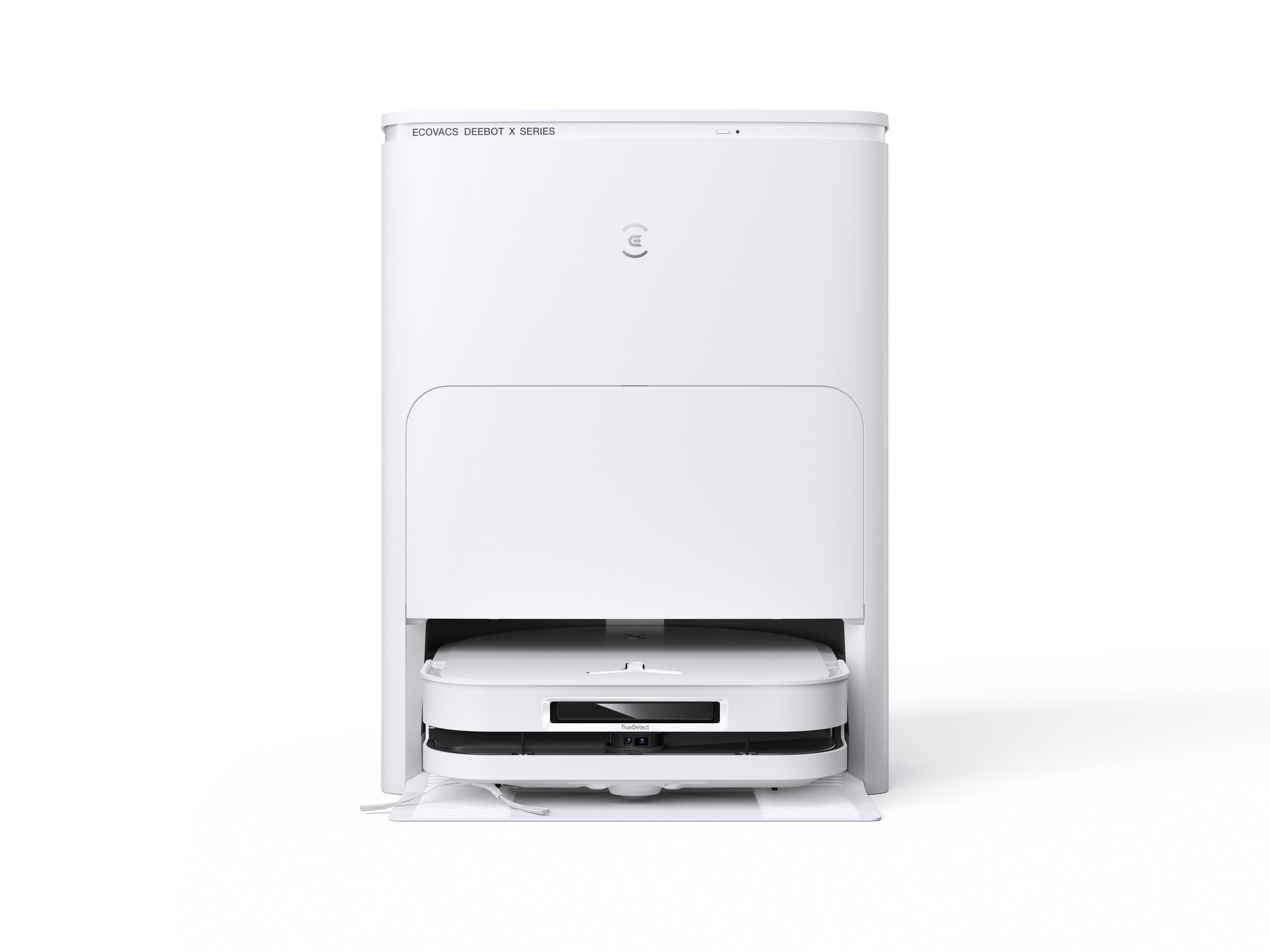 Biały odkurzacz robot i jego stacja ładująca. Robot jest zadokowany w stacji ładującej.