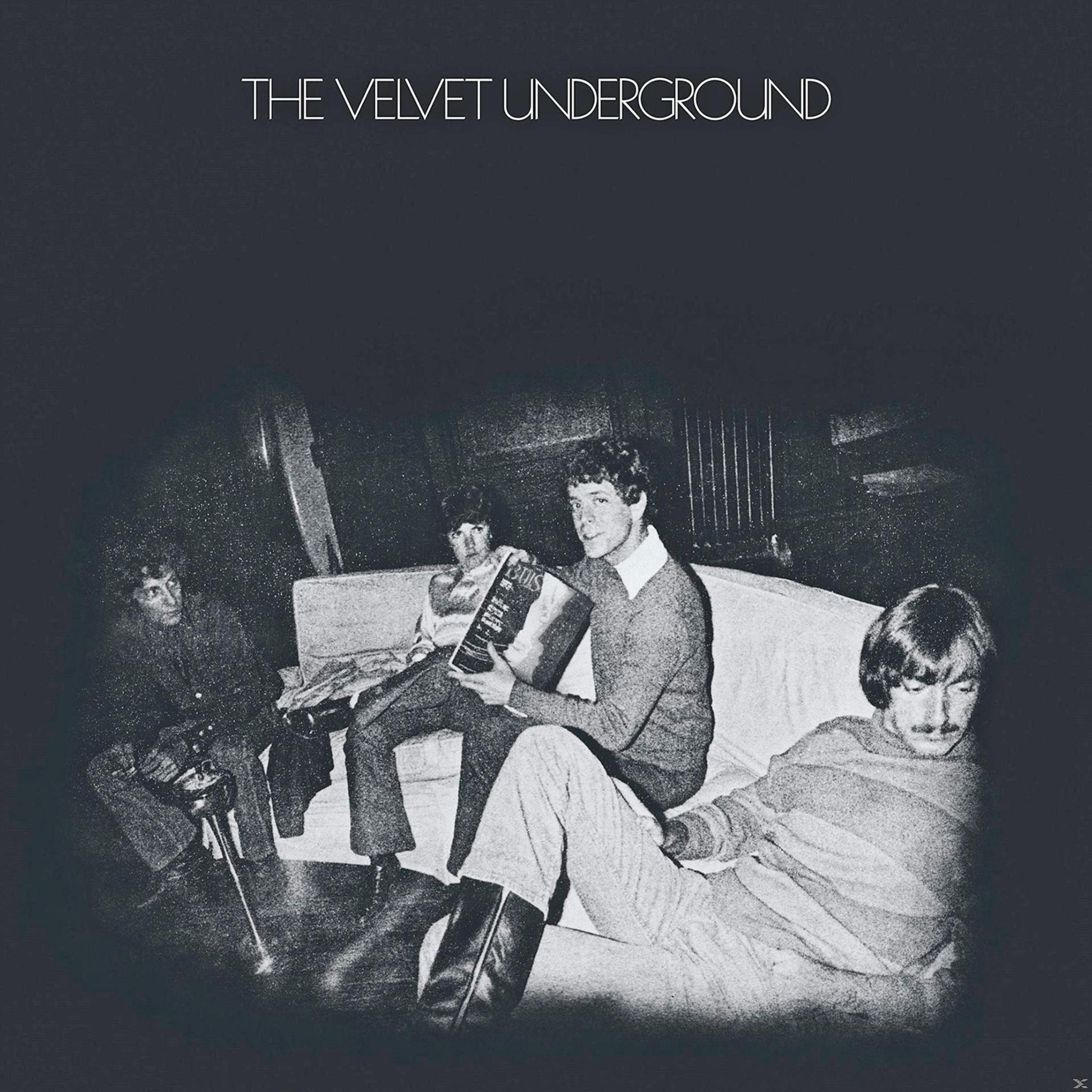 Portada del álbum de Velvet Underground, banda sentada en un sofá.