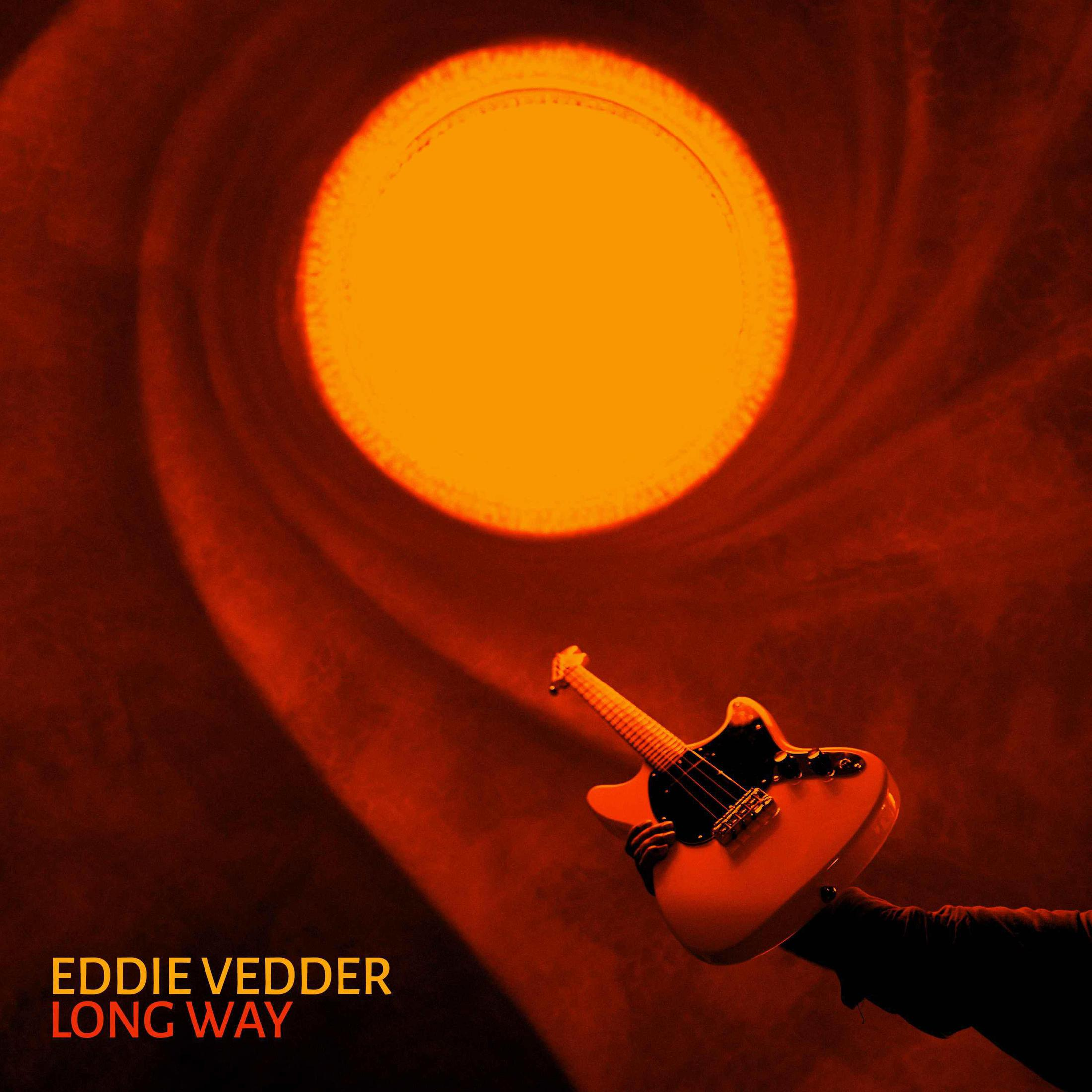 Eddie Vedder, holding a guitar. Orange sun background. The words "EDDIE VEDDER LONG WAY" are at the bottom.