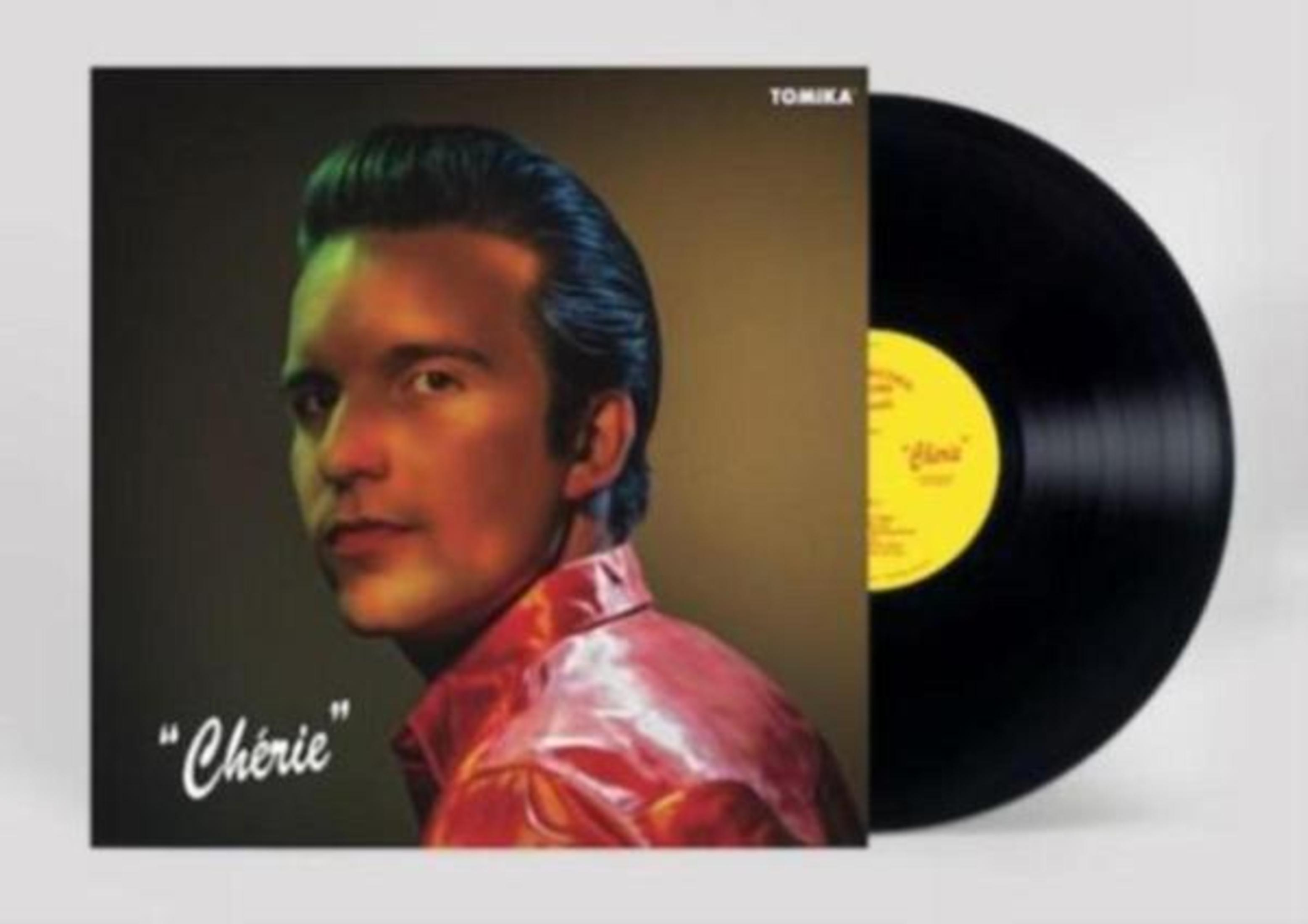 Copertina dell'album con il volto di un uomo. Disco in vinile a destra. Titolo: Cherie.