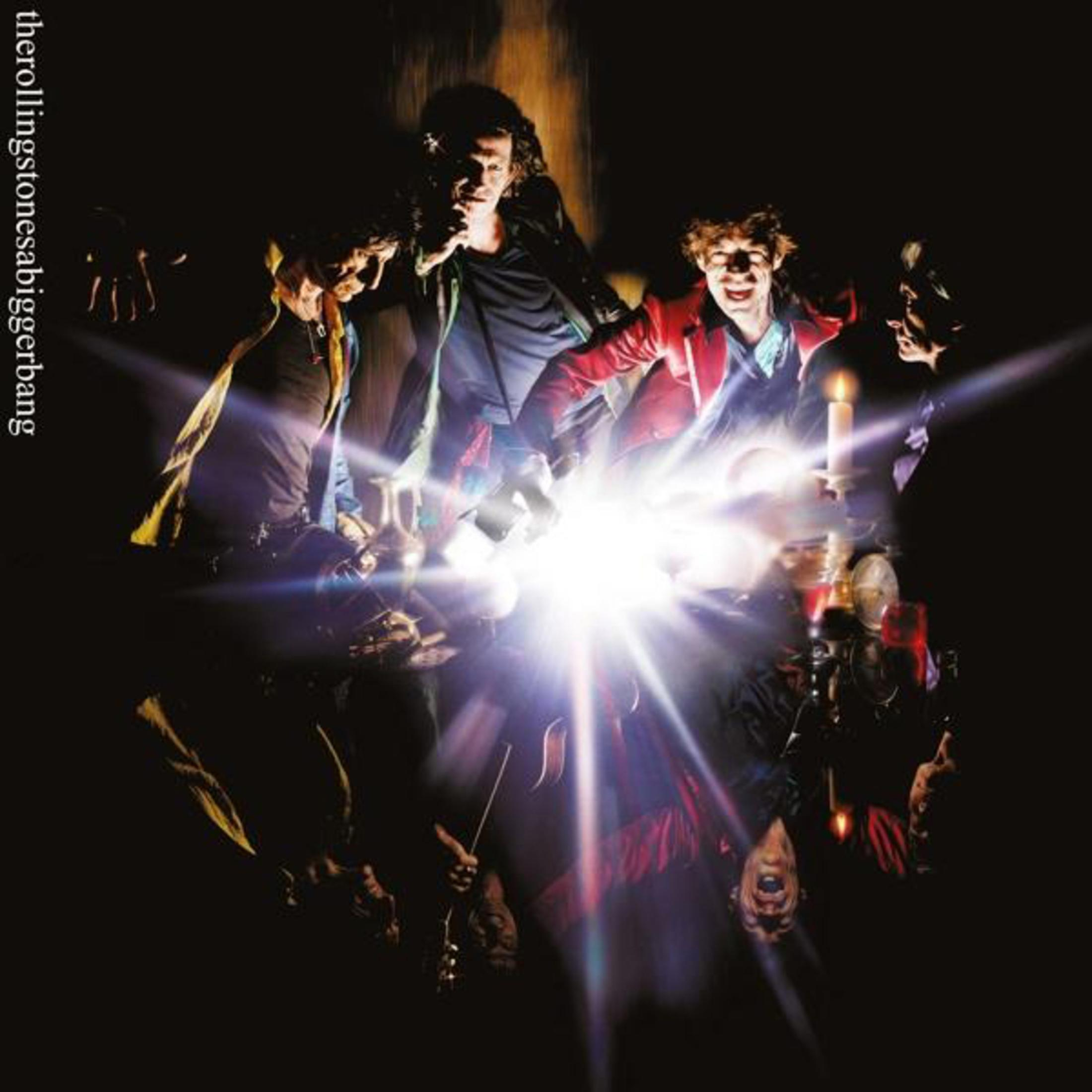 Copertina dell'album, membri della band con luci, The Rolling Stones.