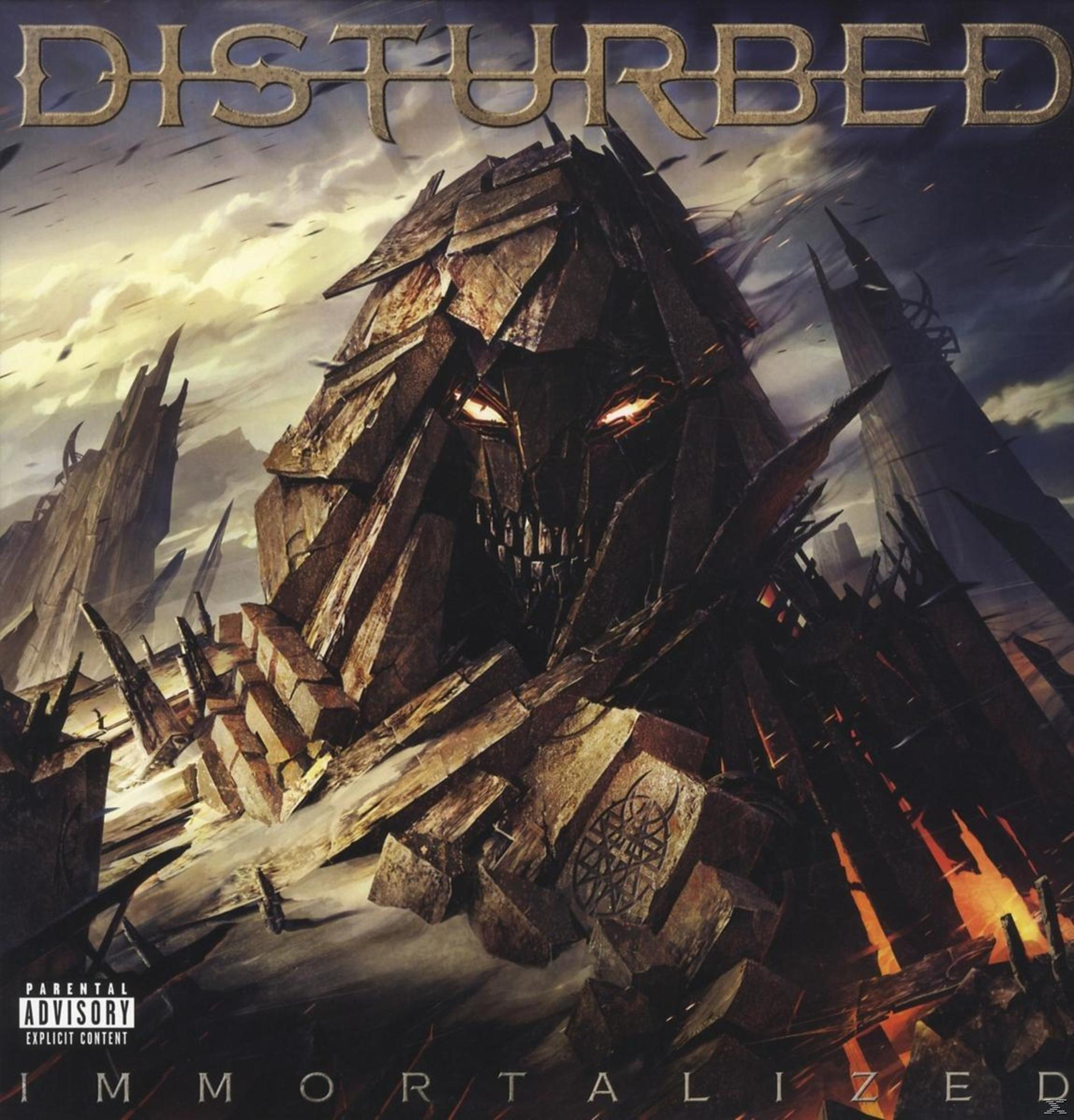 Copertina dell'album 'Immortalized' dei Disturbed. Una figura oscura con cappuccio e occhi luminosi.