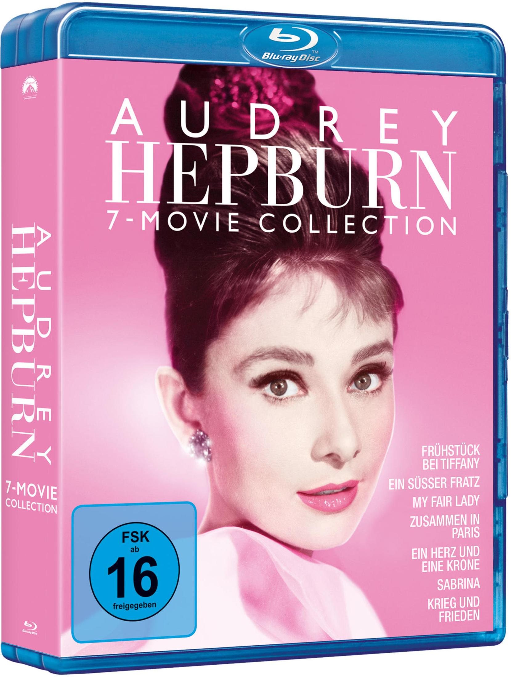 Blaue Blu-ray-Hülle mit Audrey Hepburn 7-Movie Collection auf pinkem Hintergrund und FSK-16-Logo.
