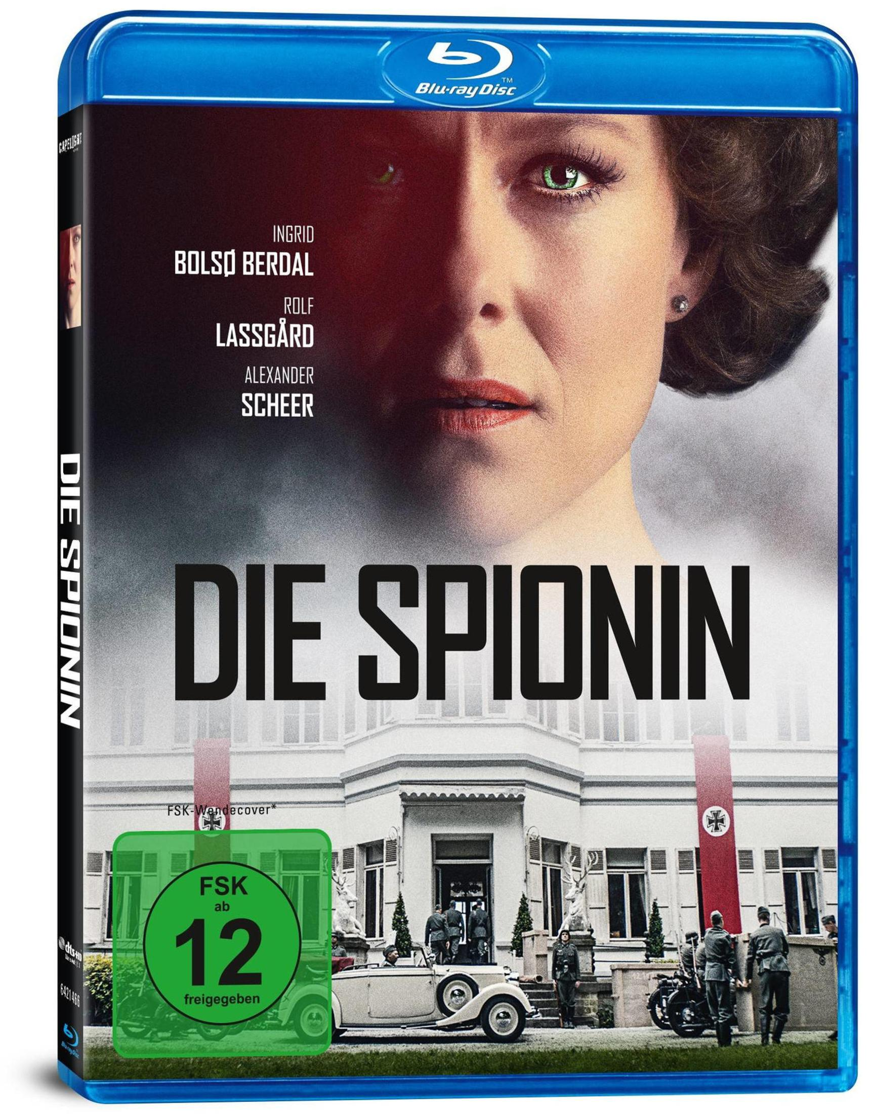 Blu-ray-Cover von 'Die Spionin' mit Frauenporträt und Soldaten vor einem Gebäude.
