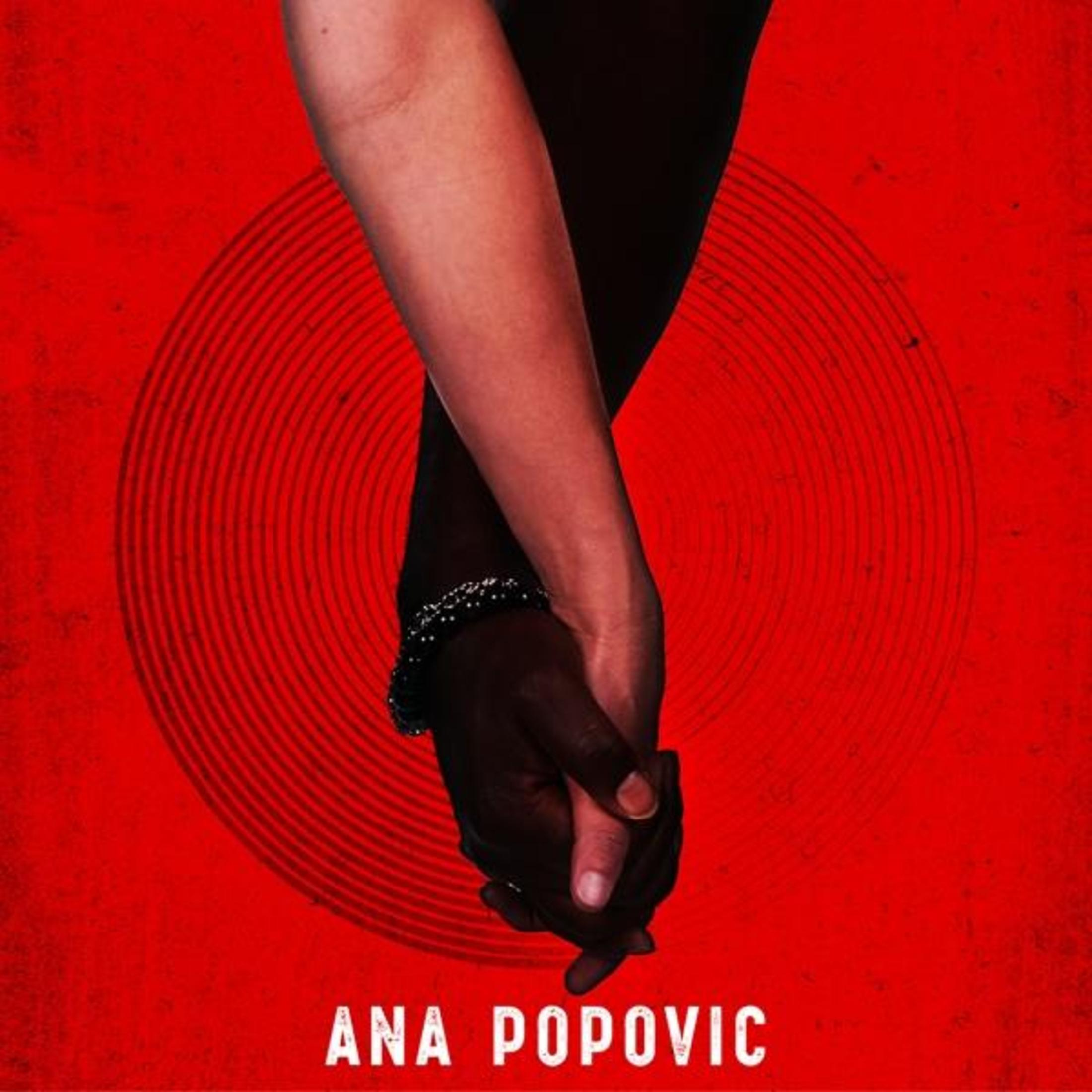 La copertina dell'album mostra mani giunte, una scura e una chiara, su un cerchio rosso su sfondo rosso.