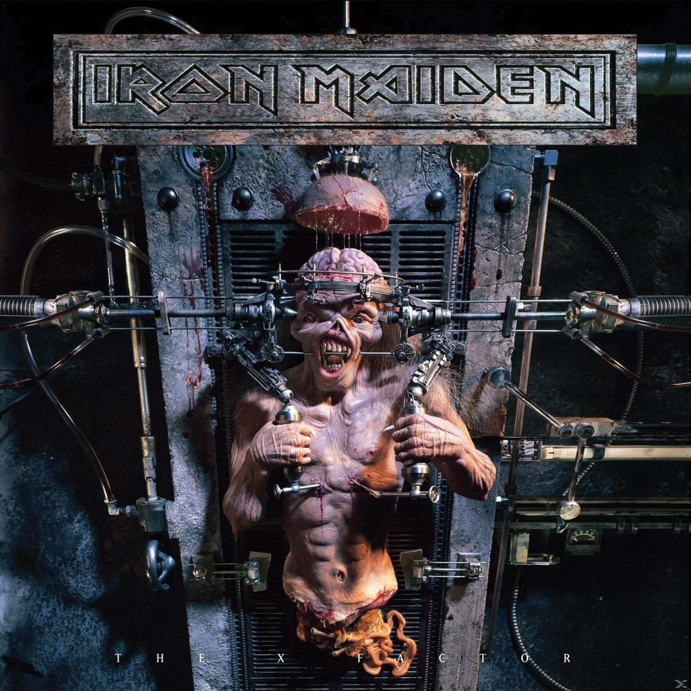 Copertina dell'album, una creatura mostruosa in una macchina. La band è Iron Maiden e l'album è 'The X Factor'.