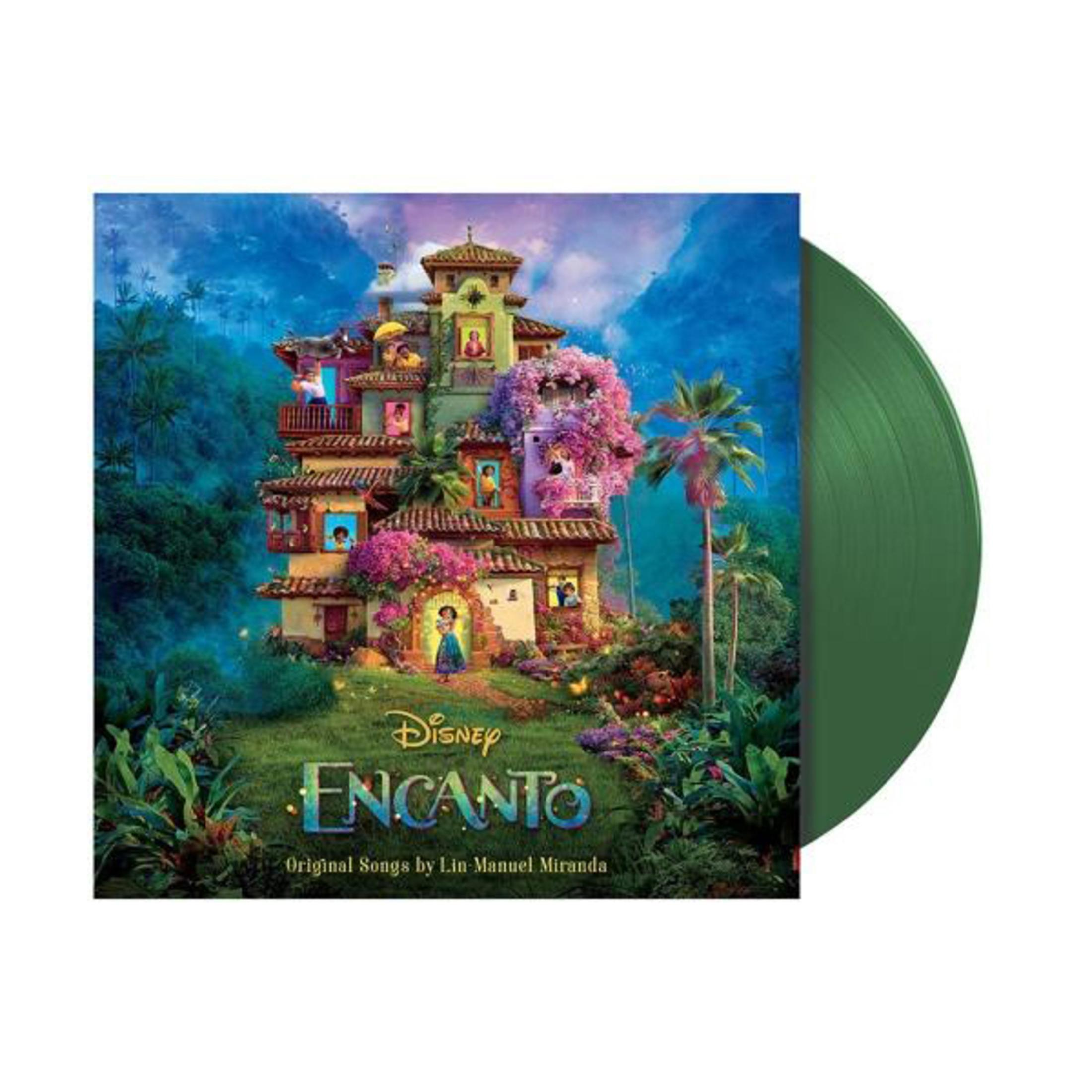 Albumhoes van 'Encanto' met een groene plaat rechts. Toont een kleurrijk gebouw en palmbomen.