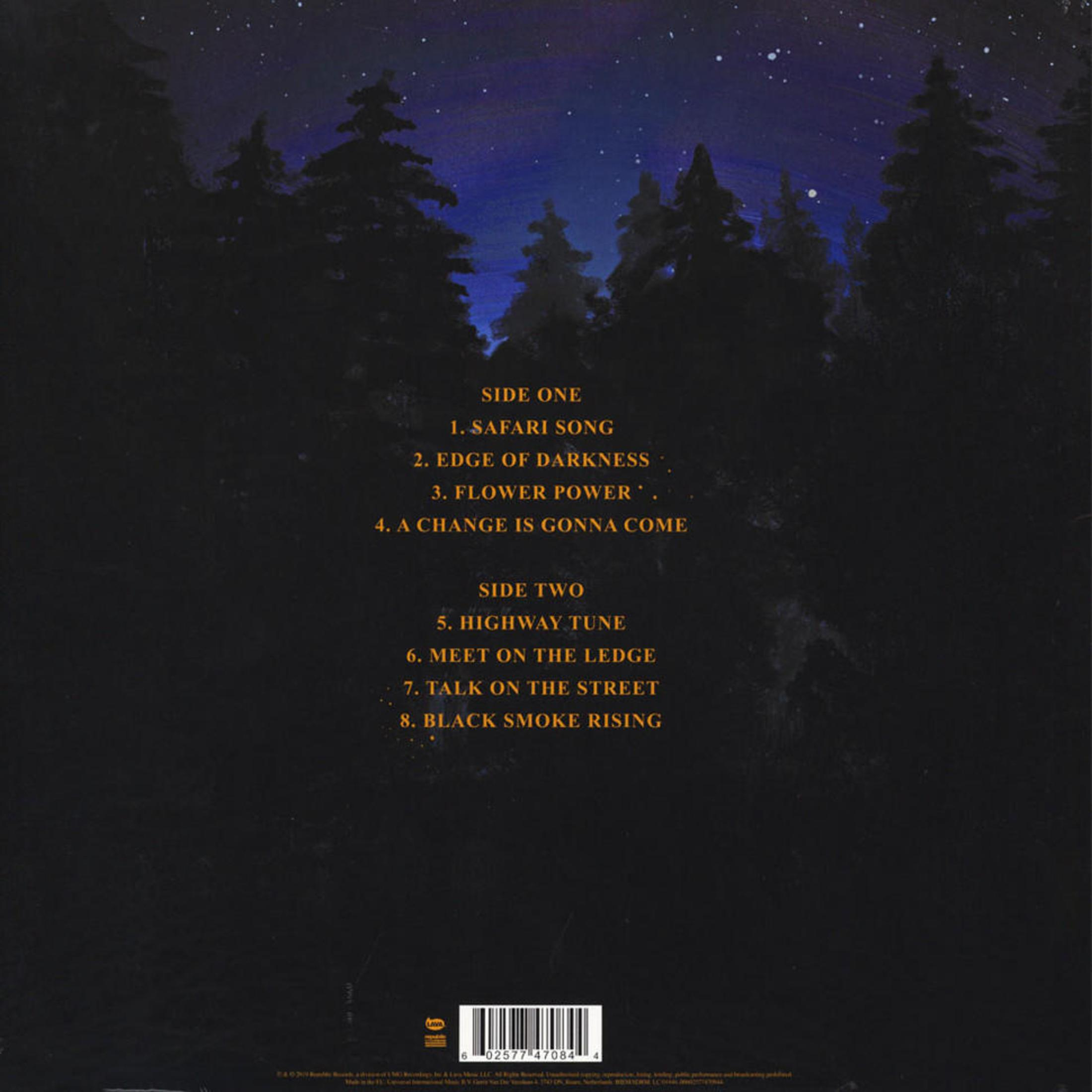 Retro dell'album. Testo sulle canzoni, i crediti e una foresta notturna con cielo stellato.