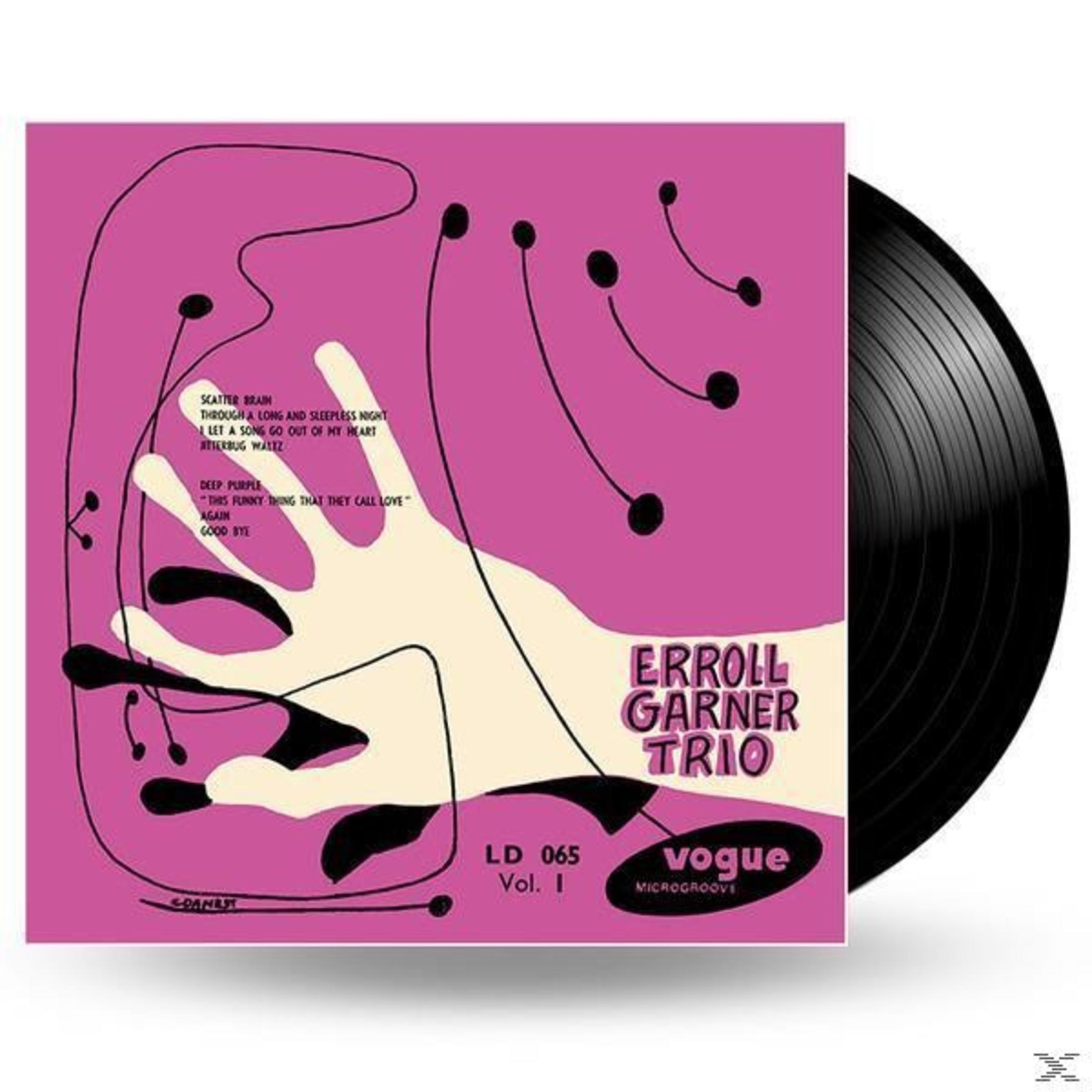 Albumhoes met een zwarte vinylplaat. De hoes heeft een roze achtergrond met abstracte kunst.
