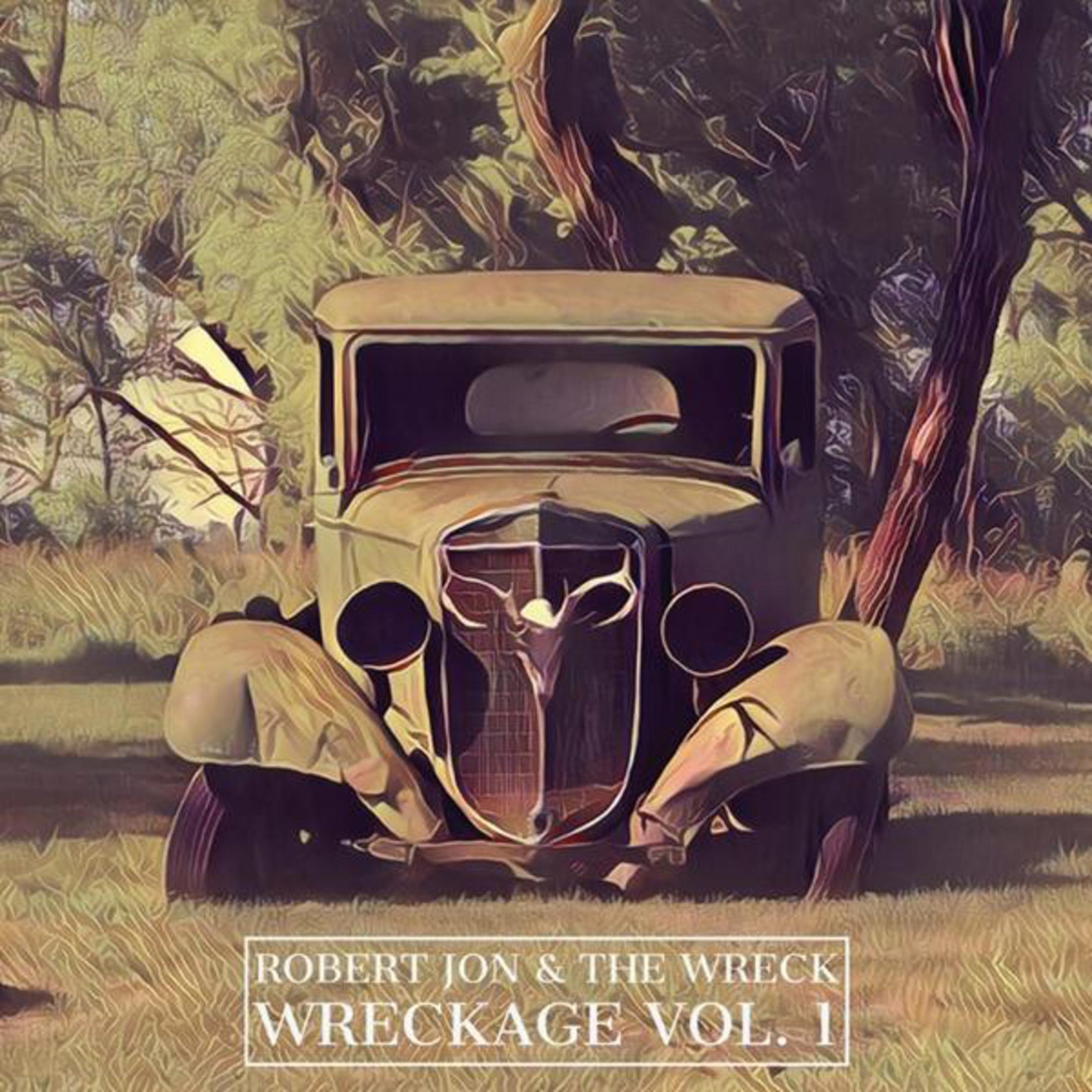 Albumhoes: 'Robert Jon & The Wreck', een oldtimer in een veld.