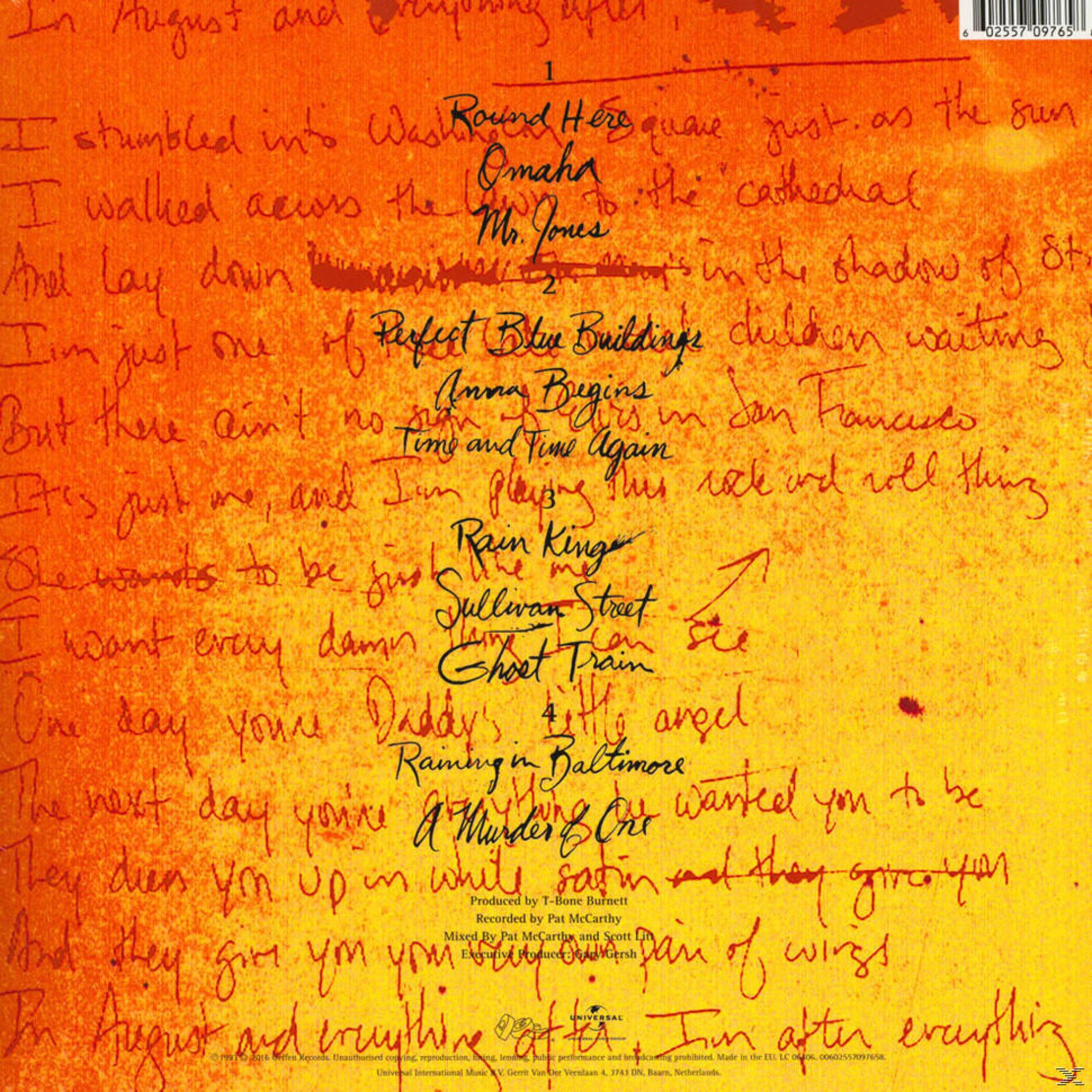 Pochette d'album avec paroles manuscrites en jaune sur fond marron. Liste les titres des chansons et les crédits.