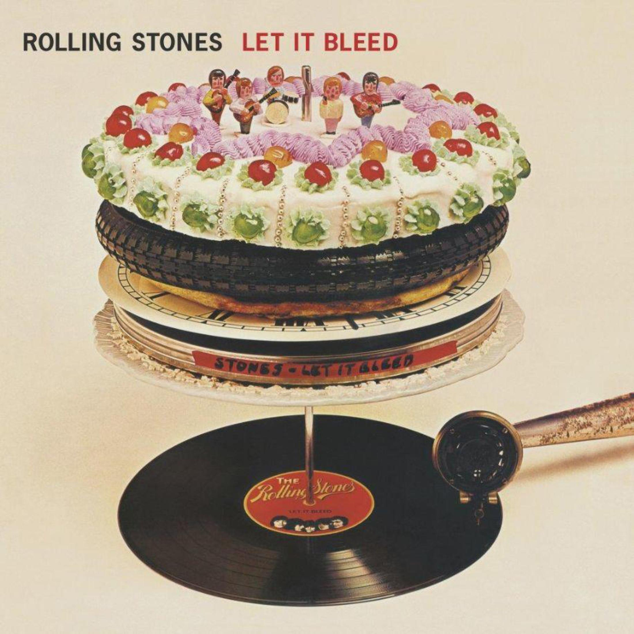 Copertina album Rolling Stones Let It Bleed: torta impilata con figure, pneumatico e disco.