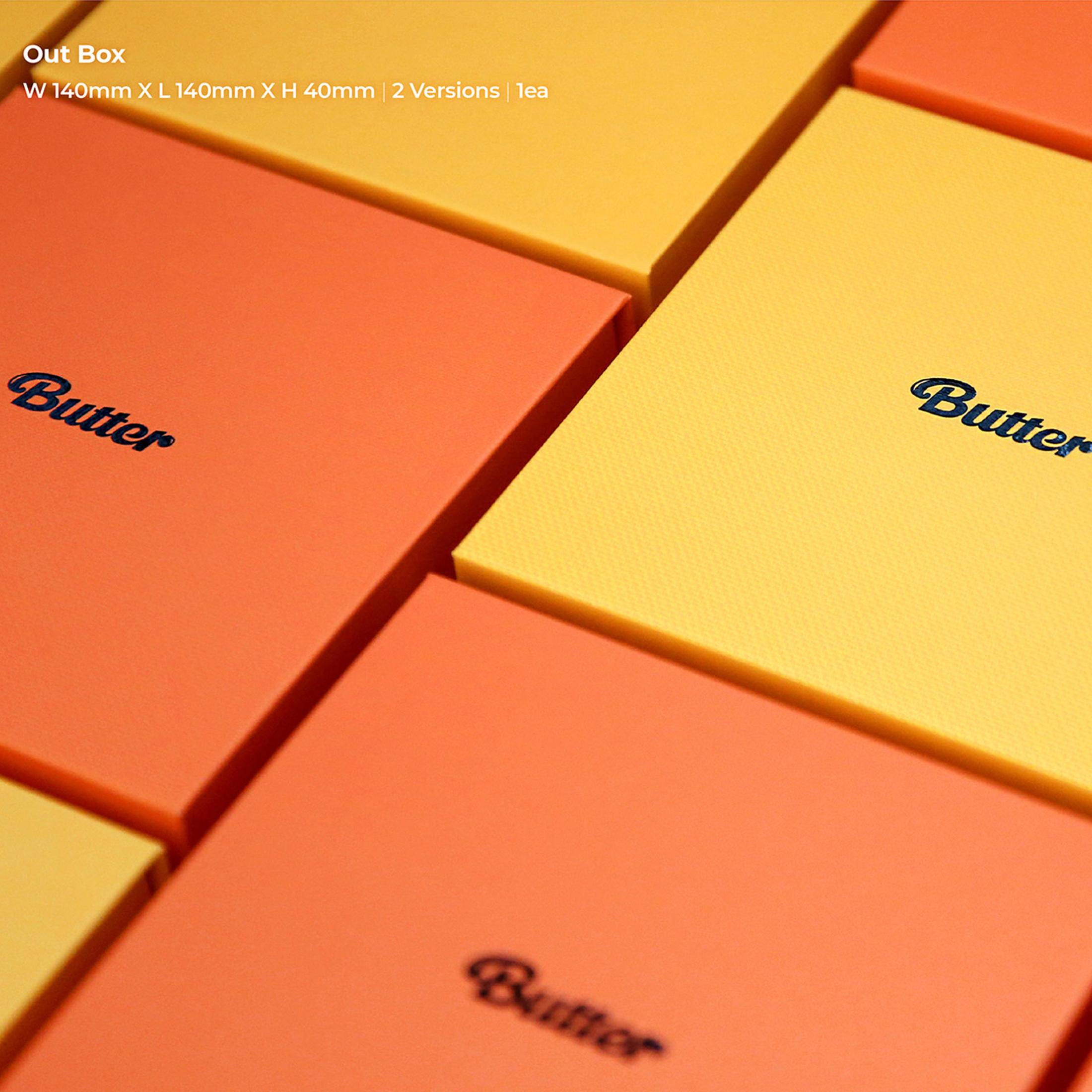 Albumhoes met oranje en gele vierkanten met de tekst 'Butter'.