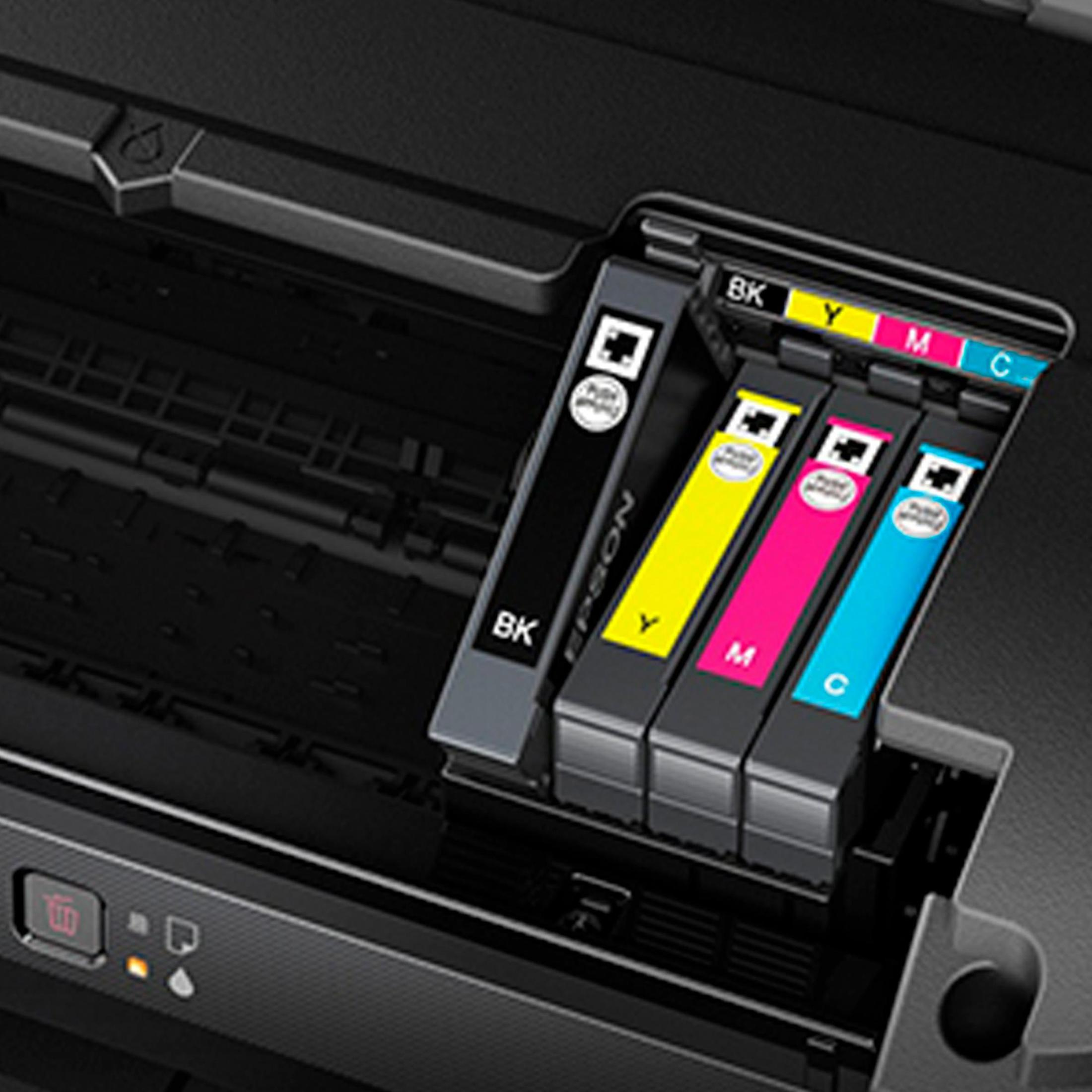 Zbliżenie na wkłady atramentowe drukarki Epson, czarny, żółty, magenta i cyjan, w środku.