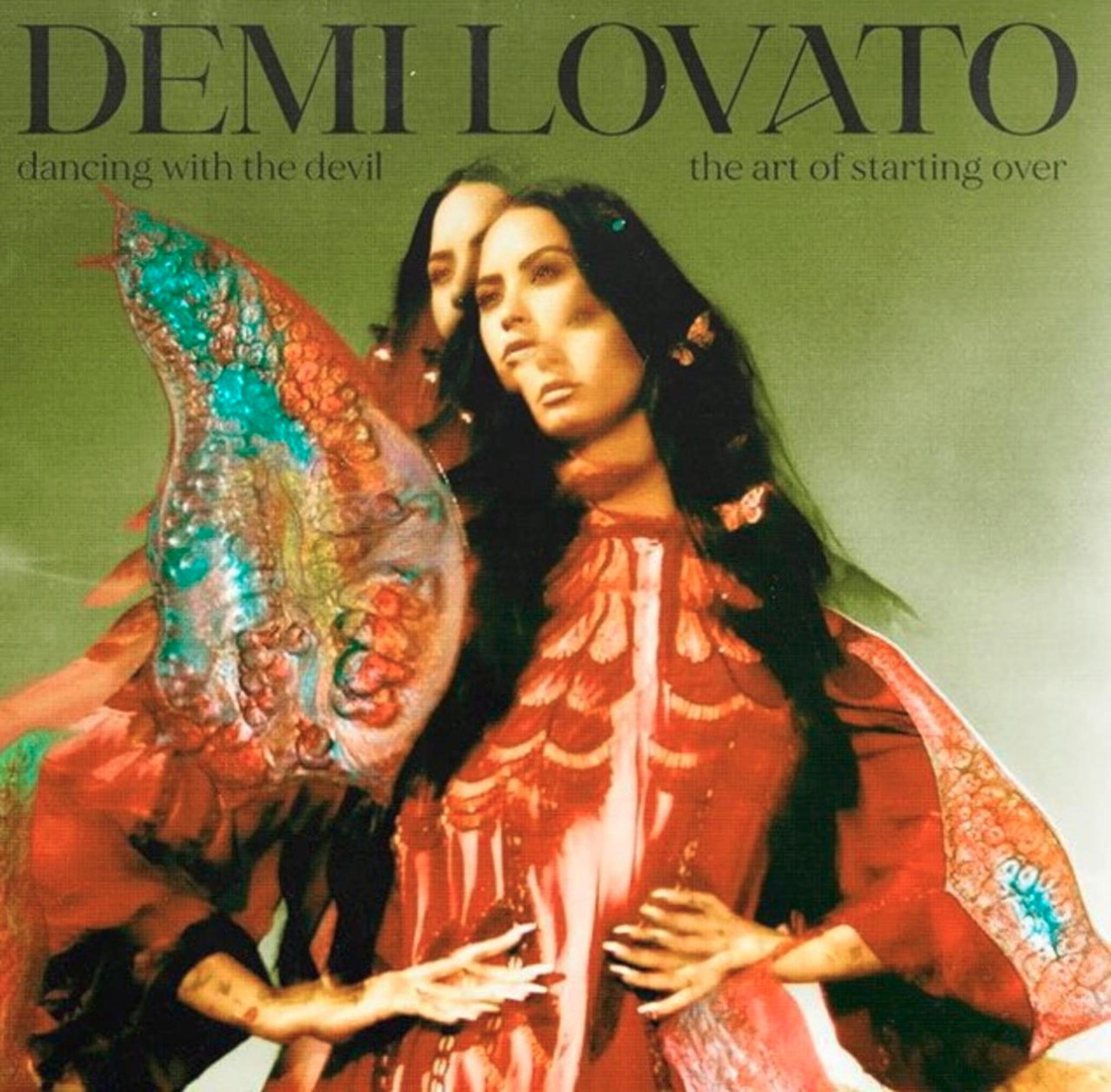 Albumhoes, Demi Lovato, dansen met de duivel. Twee vrouwen met rode en groene tinten.