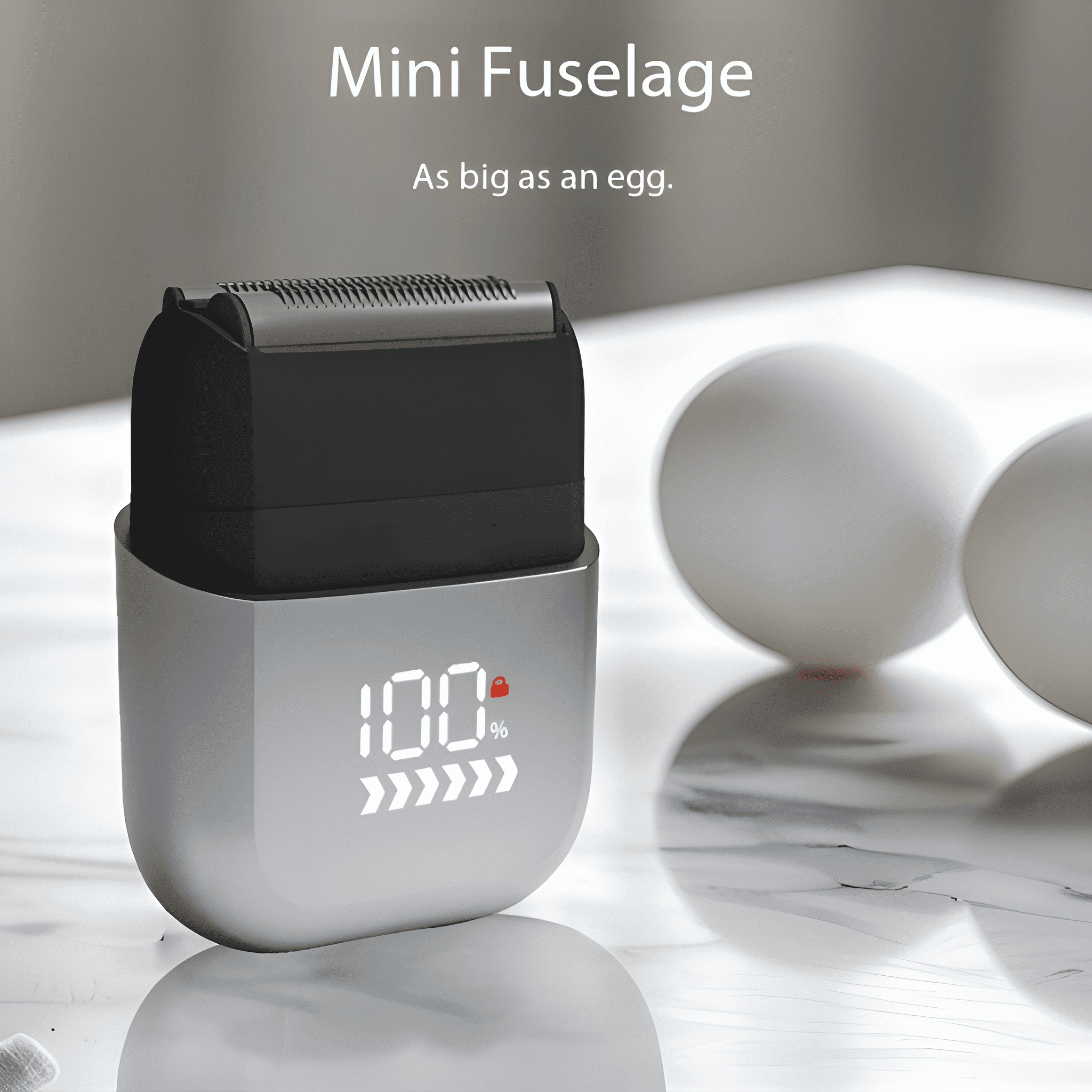 Ein Mini-Elektrorasierer mit Digitalanzeige und zwei Eiern.