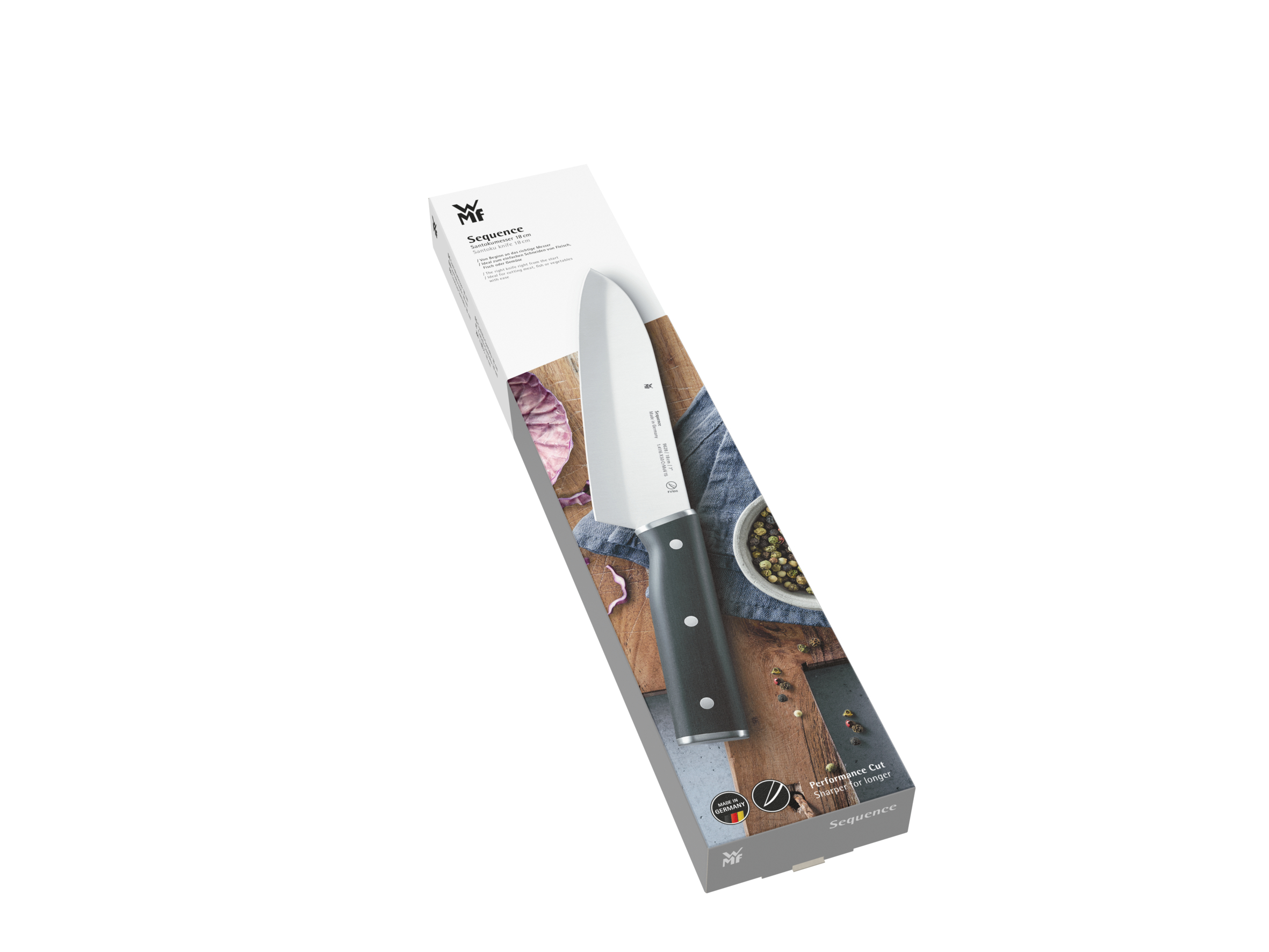 Ein Messer in einer Schachtel mit schwarzem Griff. Die Schachtel ist weiß mit einem Bild des Messers.