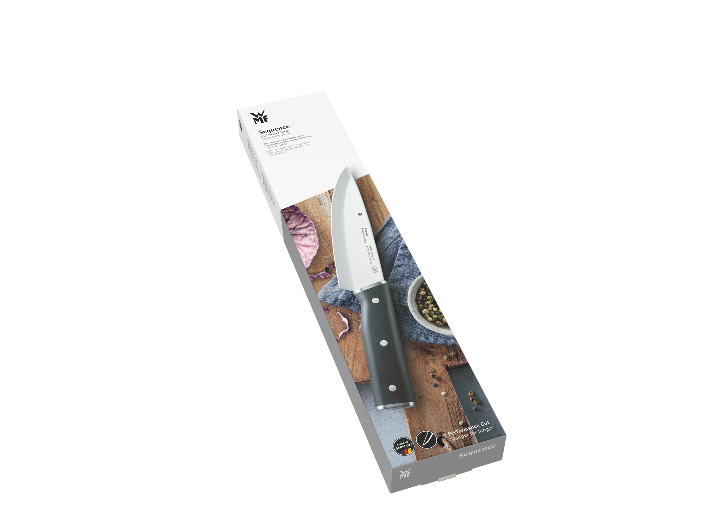 Ein Messer in einer Schachtel. Das Messer hat einen schwarzen Griff und eine silberne Klinge.