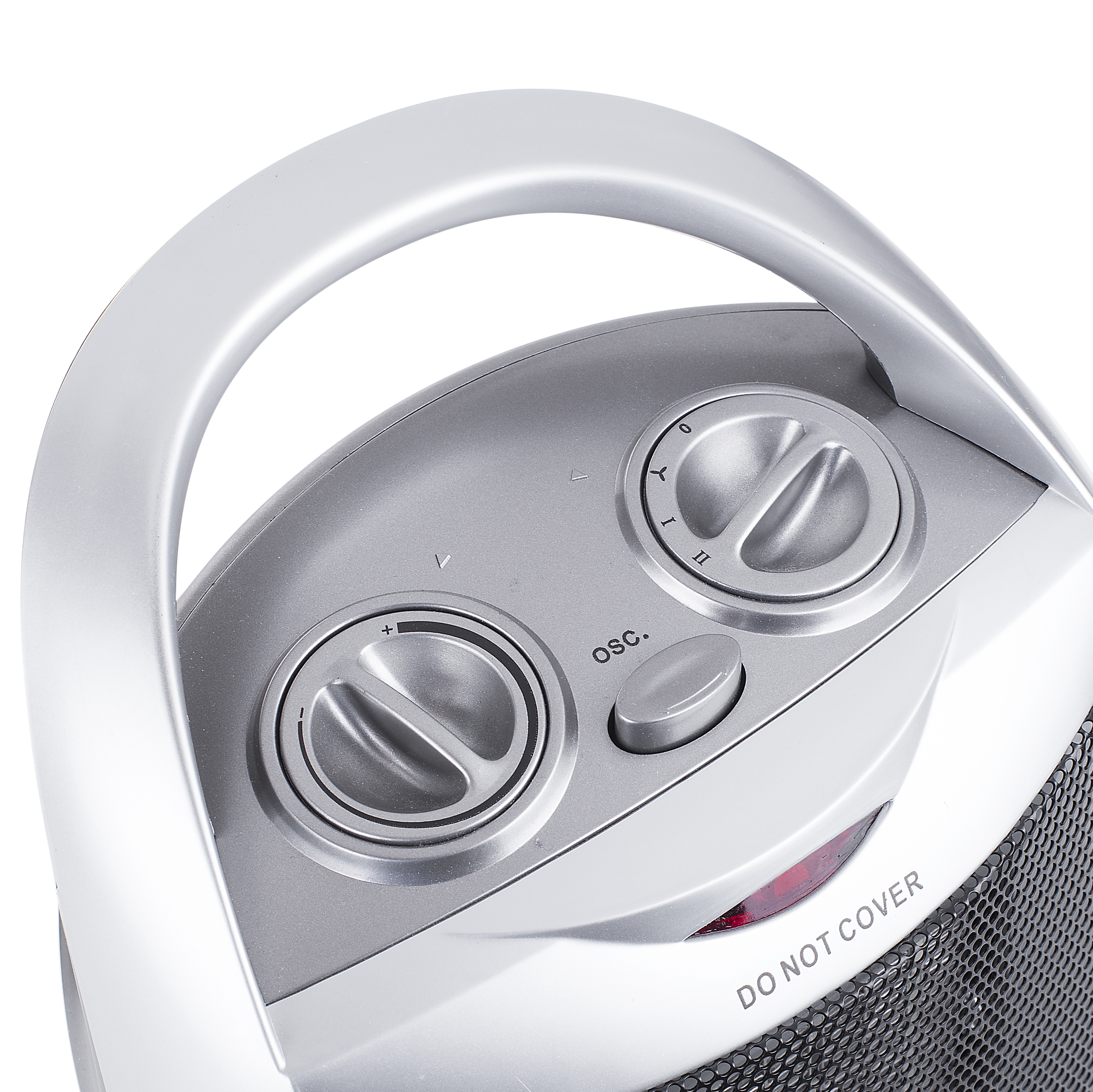 Chauffage argenté avec boutons de commande. La poignée est arquée et dit 'DO NOT COVER'.