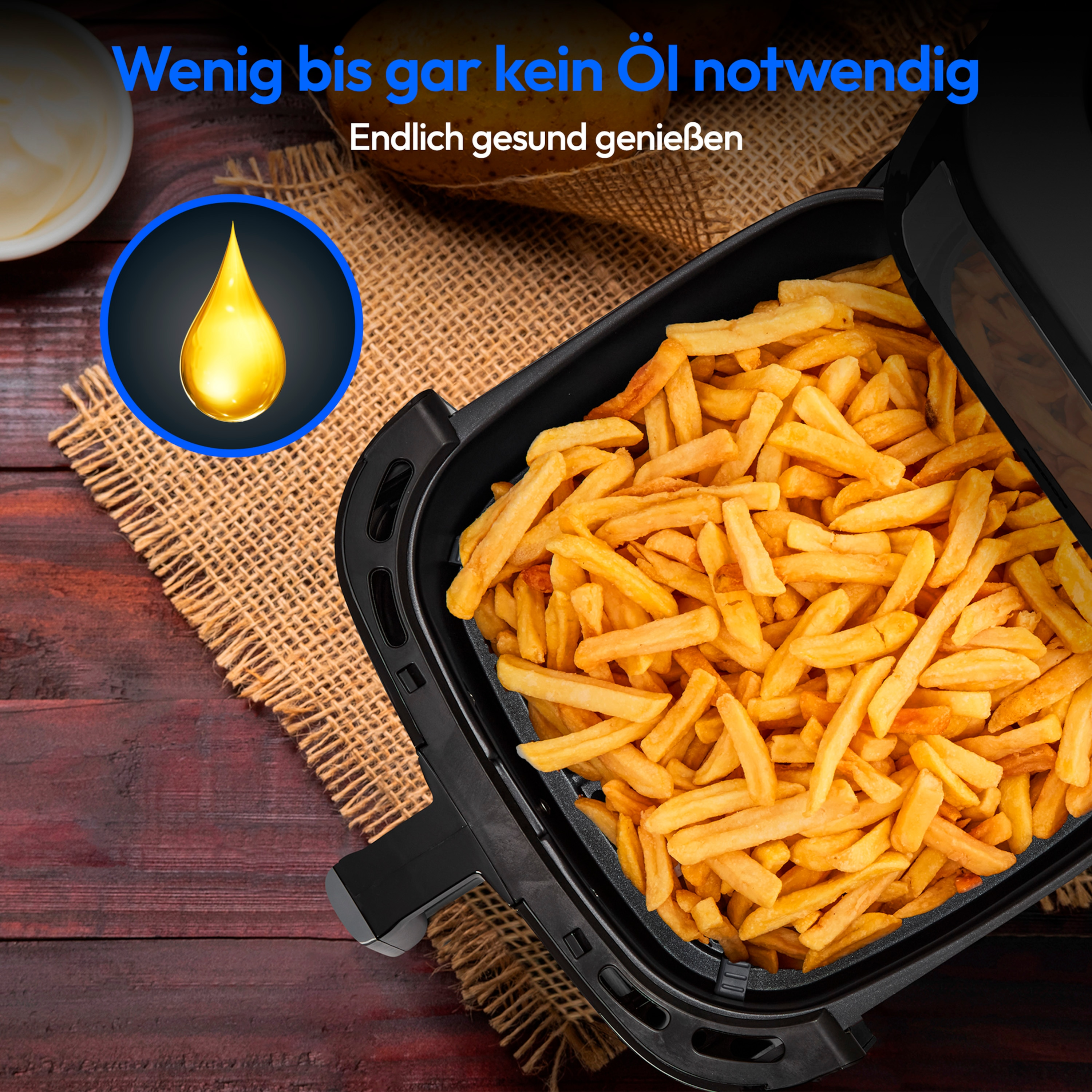 Frytkownica powietrzna z usmażonymi frytkami, kroplą oleju i tekstem po niemiecku.