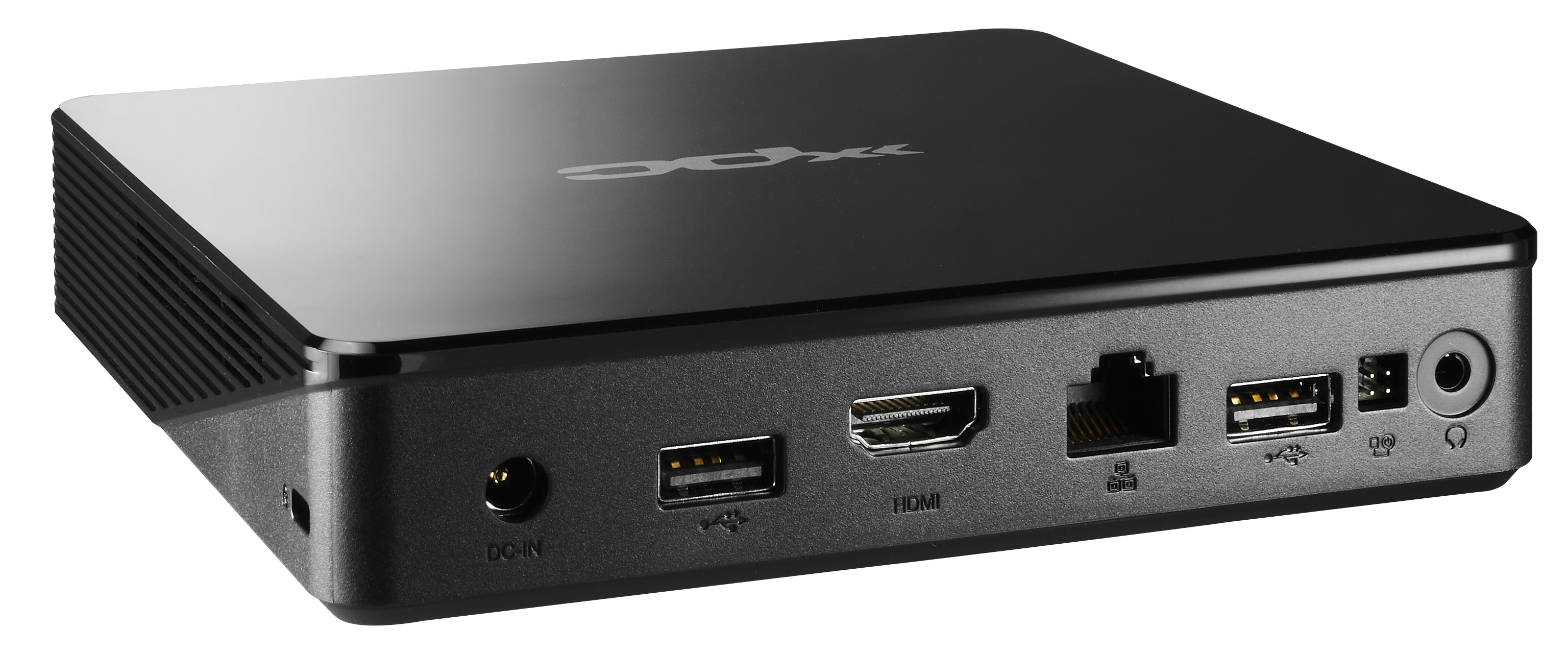 Mini PC XPC negro. Tiene varios puertos en la parte trasera, incluyendo HDMI y USB.