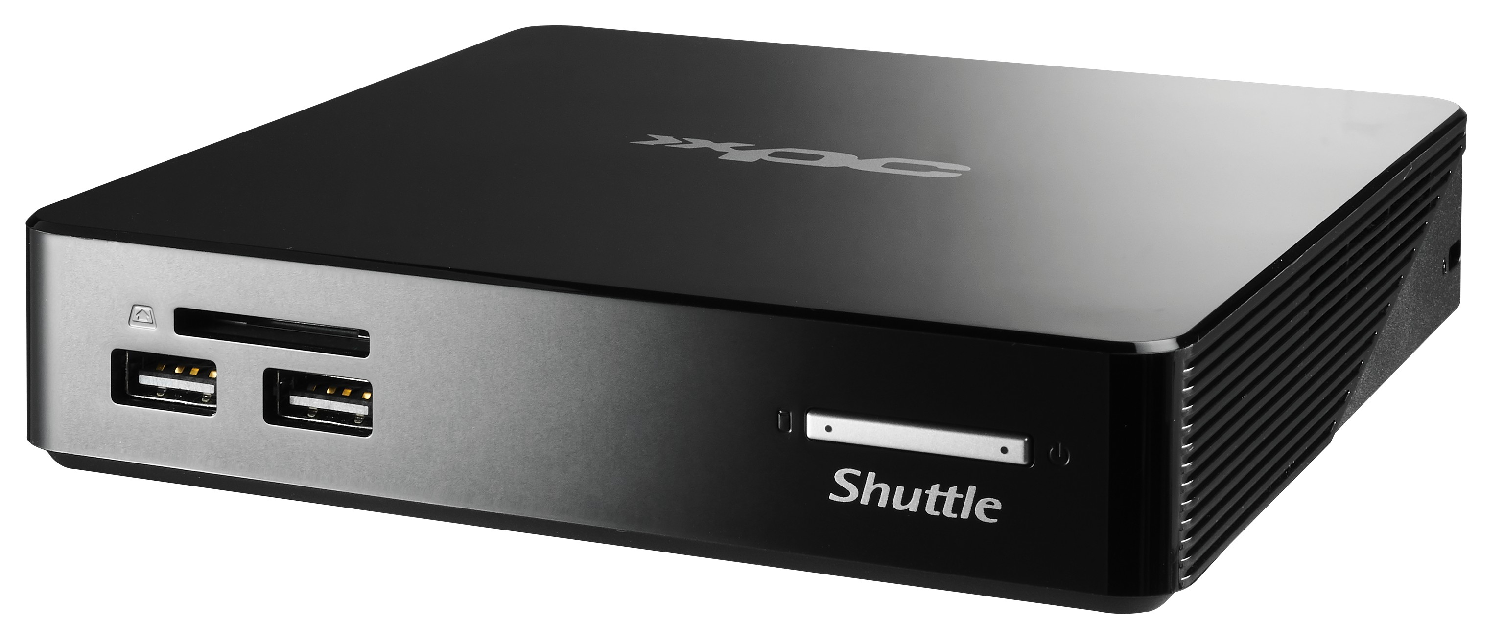 Ordenador Shuttle XPC negro. El frente tiene puertos USB y lector de tarjetas. Logotipo Shuttle arriba.