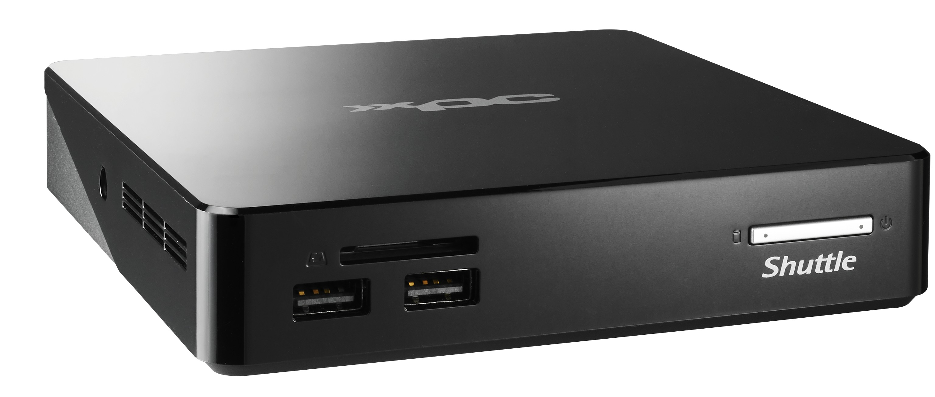 Ordenador XPC negro. Parte frontal con ranuras para tarjetas SD y puertos USB. Logo Shuttle a la derecha.