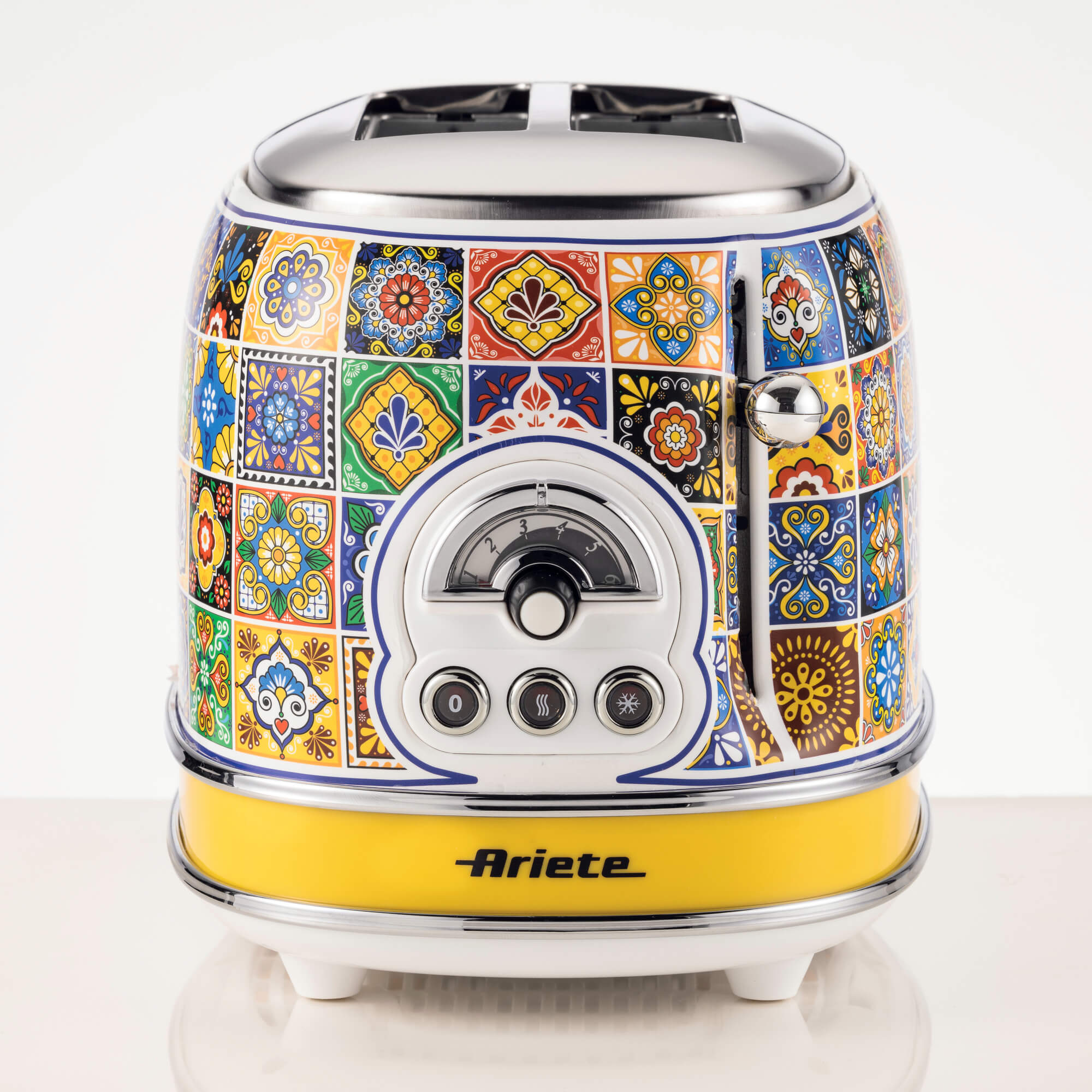 Colorful retro toaster with a patterned design and yellow base.