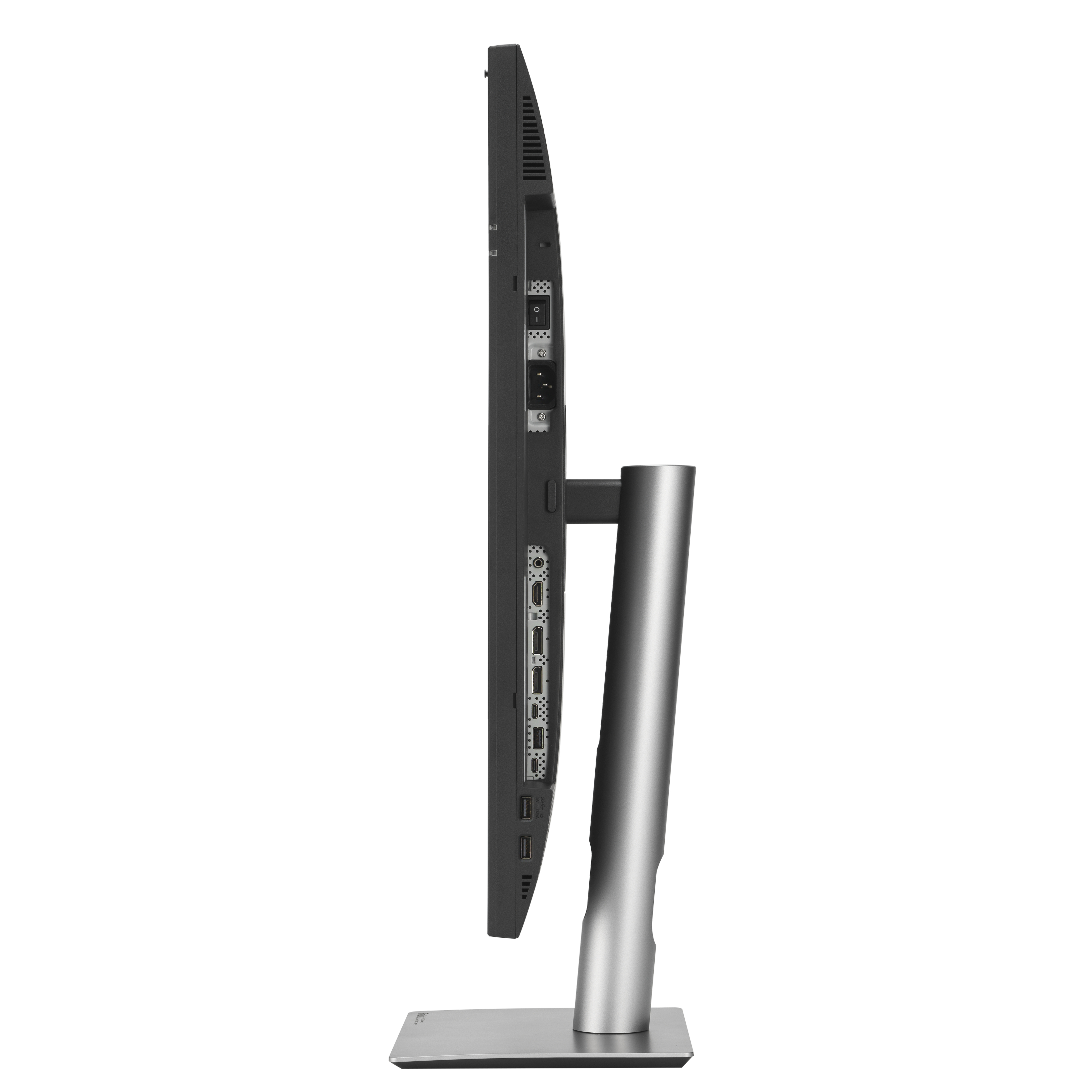 Widok z boku czarnego monitora komputera na srebrnej podstawie.