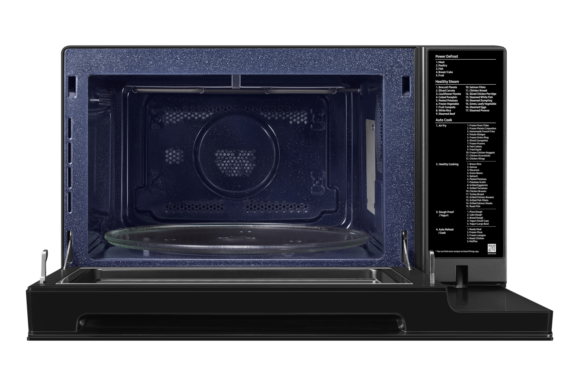 Kuchenka mikrofalowa z otwartymi drzwiami. Ciemnoniebieskie wnętrze. Białe tło.