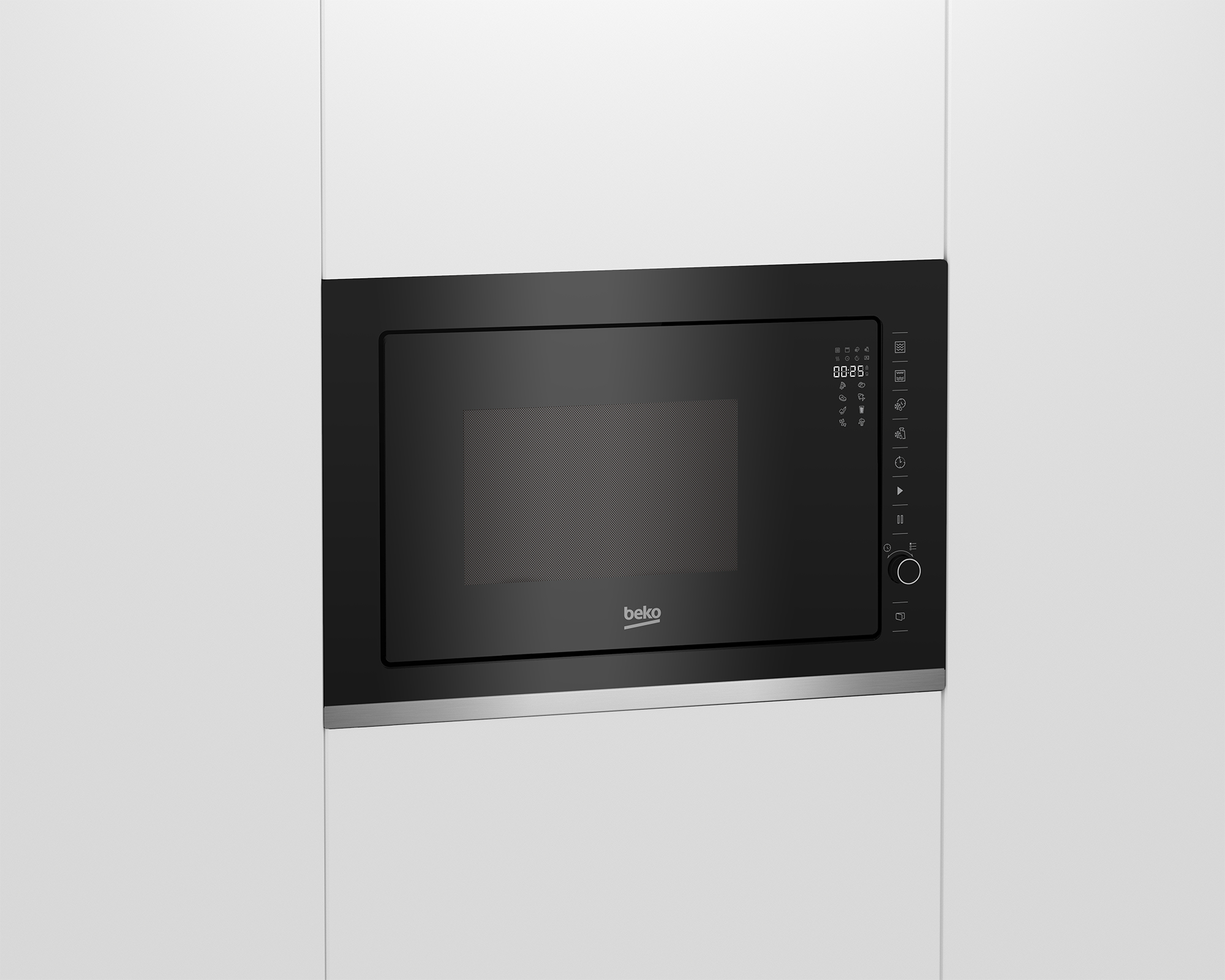 Horno microondas Beko negro empotrado. El microondas está en un mueble blanco. Pantalla digital visible.