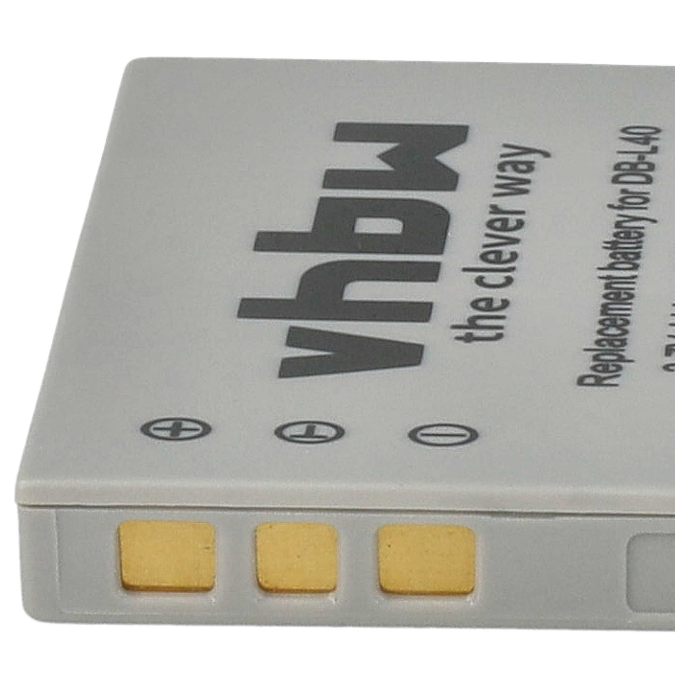 Eine graue Batterie mit Goldkontakten. Der Text oben lautet "MQVA the clever way" und "Ersatzbatterie".