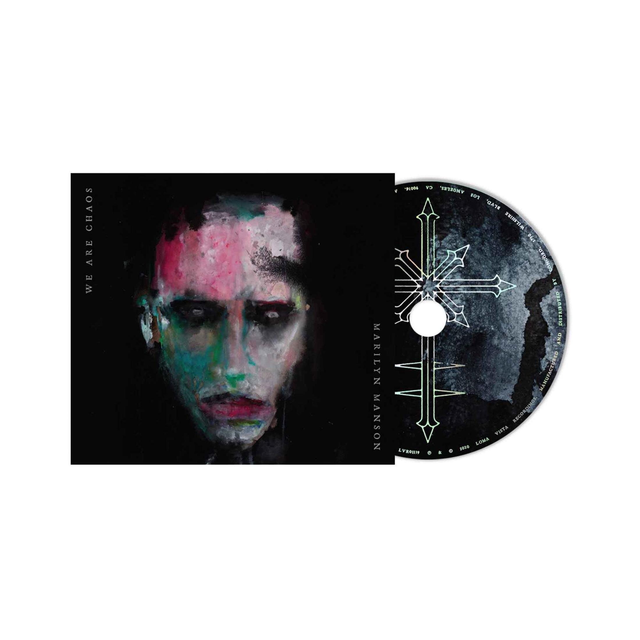Okładka albumu Marilyn Manson. Twarz na ciemnym tle. Płyta CD widoczna. Białe tło.