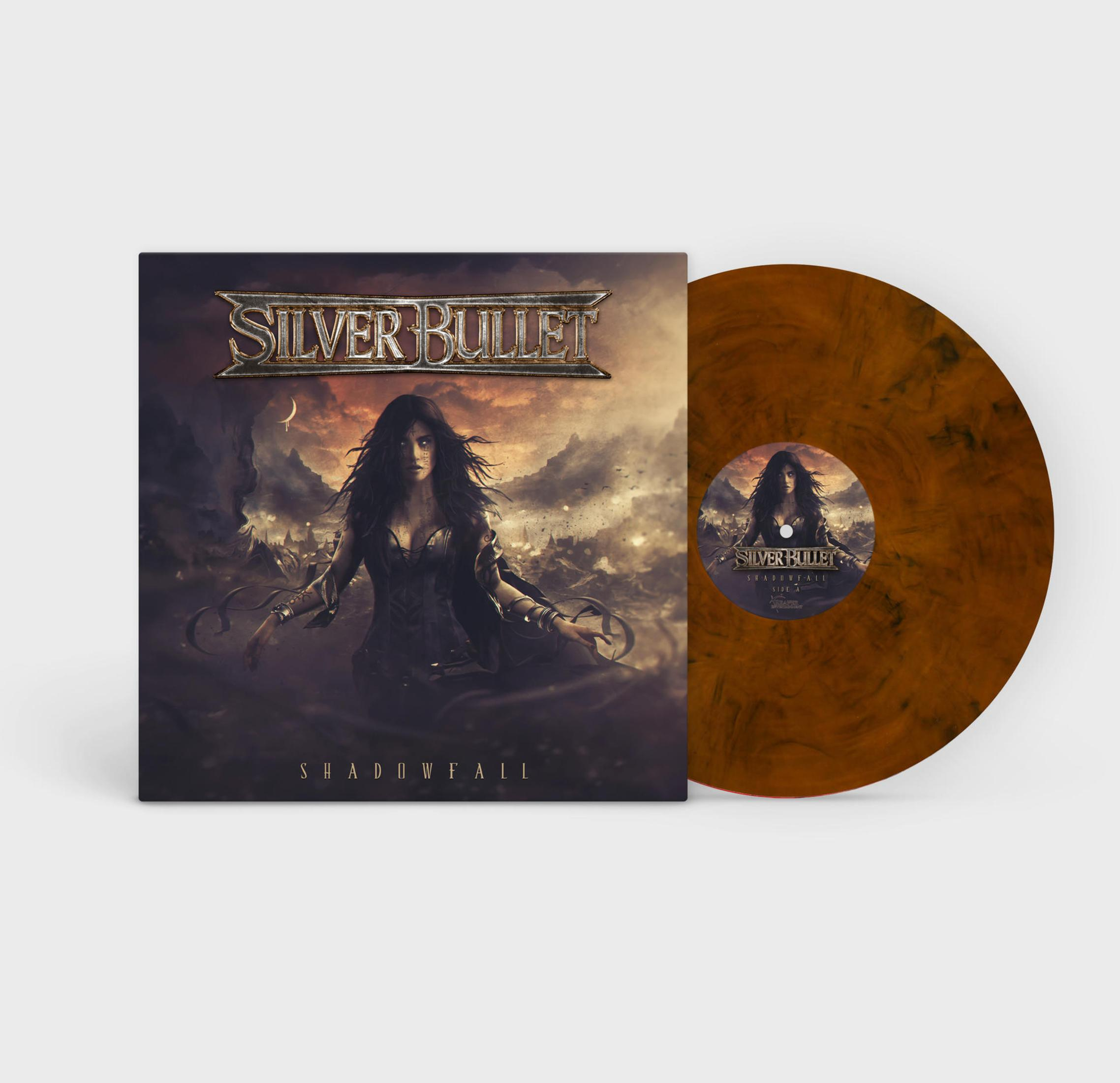 Pochette d'album avec une femme et un fond sombre. Le texte indique "SILVER BULLET SHADOWFALL".