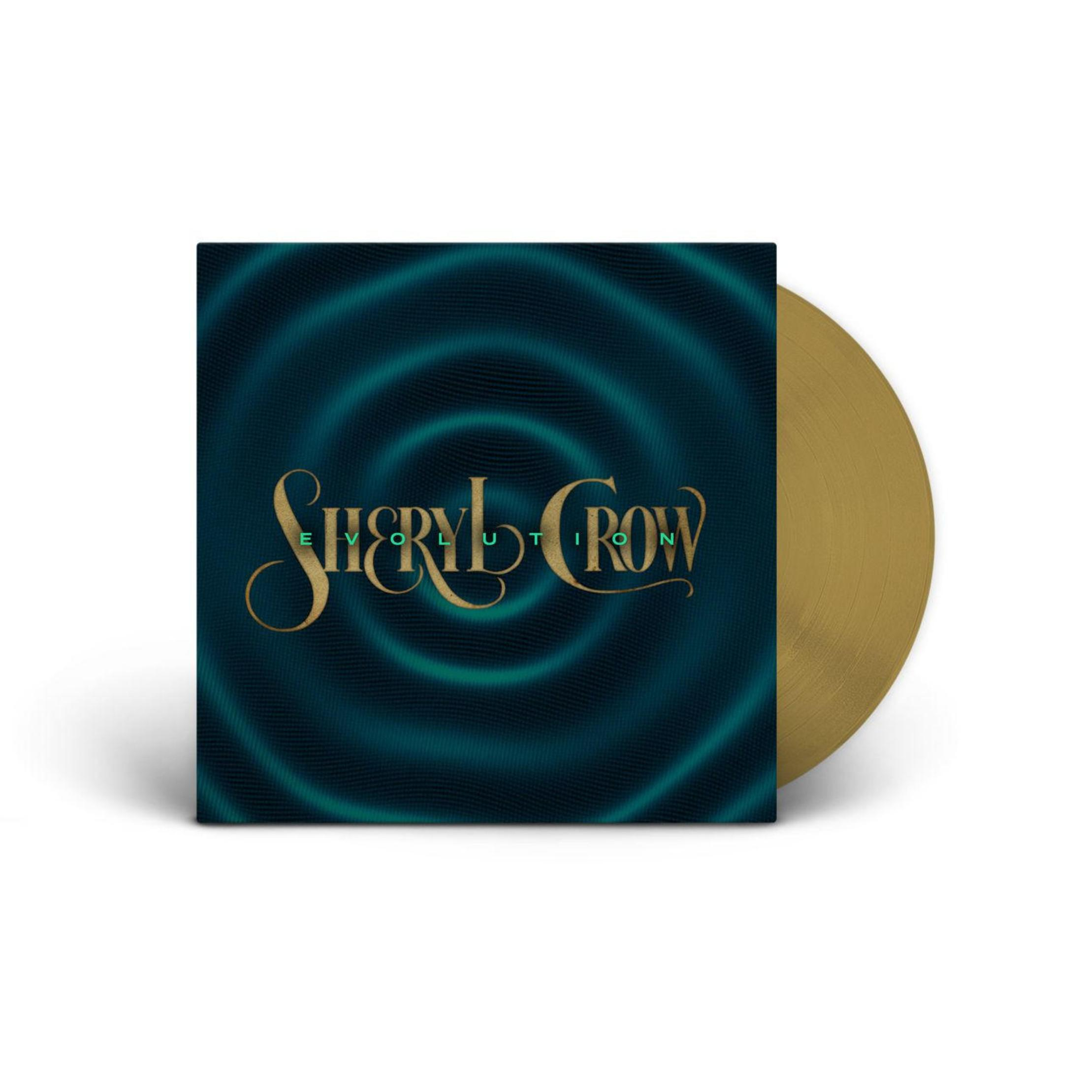 Copertina dell'album di Sheryl Crow, vinile dorato, sfondo verde acqua con vortici e testo dorato.